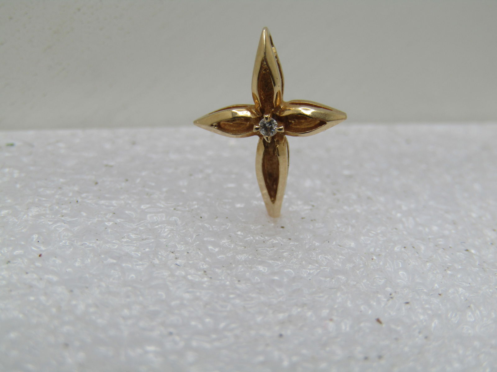 Vintage 14kt Diamond Cross Pendant, Signed, 1960's: Title:Vintage 14kt Diamond Cross Pendant, Signed, 1960'sDescription:Vintage 14kt Diamond Cross Pendant, Signed, 1960's. Pendant only, not a necklace. It has open work front to the corss and closed