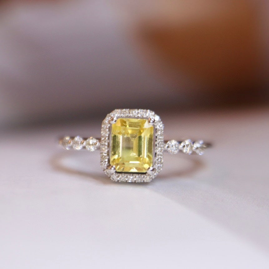 14K GOLD 1.16 CTW NATURAL SAPPHIRE & DIAMOND RING: Title:14K GOLD 1.16 CTW NATURAL SAPPHIRE & DIAMOND RING Description:Ref:230528502Gold Content:14K GoldRing Size:7.25USMain Gemstone:SapphireNumber of stones:1Shape:OctagonalCarat Weight:1.0ct Color:Ye