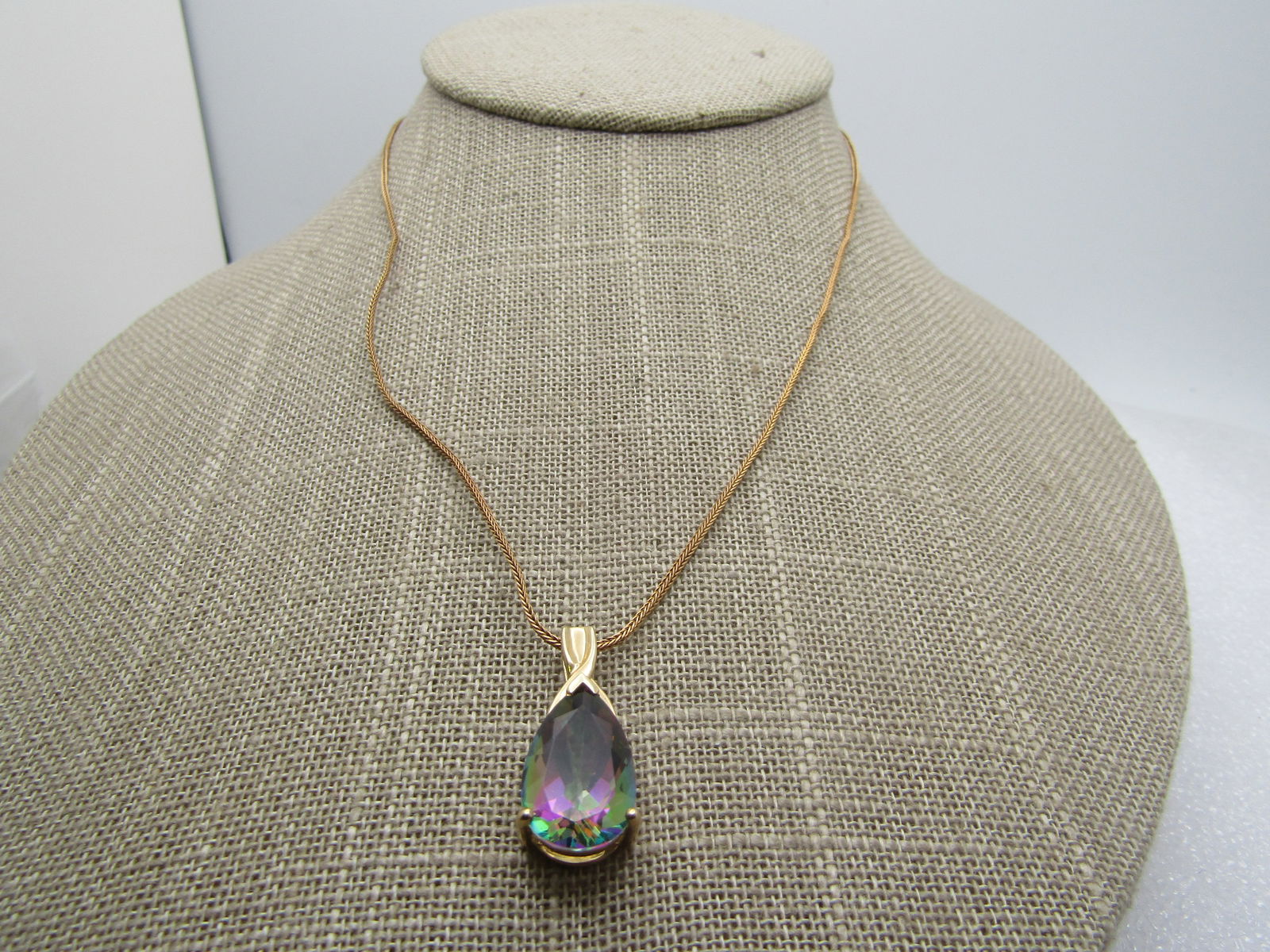 Vintage 10kt Mystic Topaz Necklace, 9kt 20" Chain, Signed: Title:Vintage 10kt Mystic Topaz Necklace, 9kt 20" Chain, SignedDescription:Vintage 10kt Mystic Topaz Necklace, 9kt 20" Chain, Signed THL on the pendant and marked 10kt. The chain is marked with