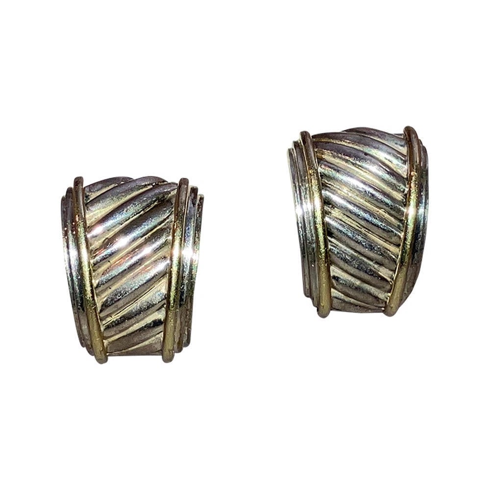 David Yurman Sterling 14 kt Cable Earrings: Title:David Yurman Sterling 14 kt Cable EarringsDescription:David Yurman Sterling 14 kt Cable Earrings. Circa, 1990's. Earrings measure 1" long and 3/4" wide. Earrings are for non pierced ears. 