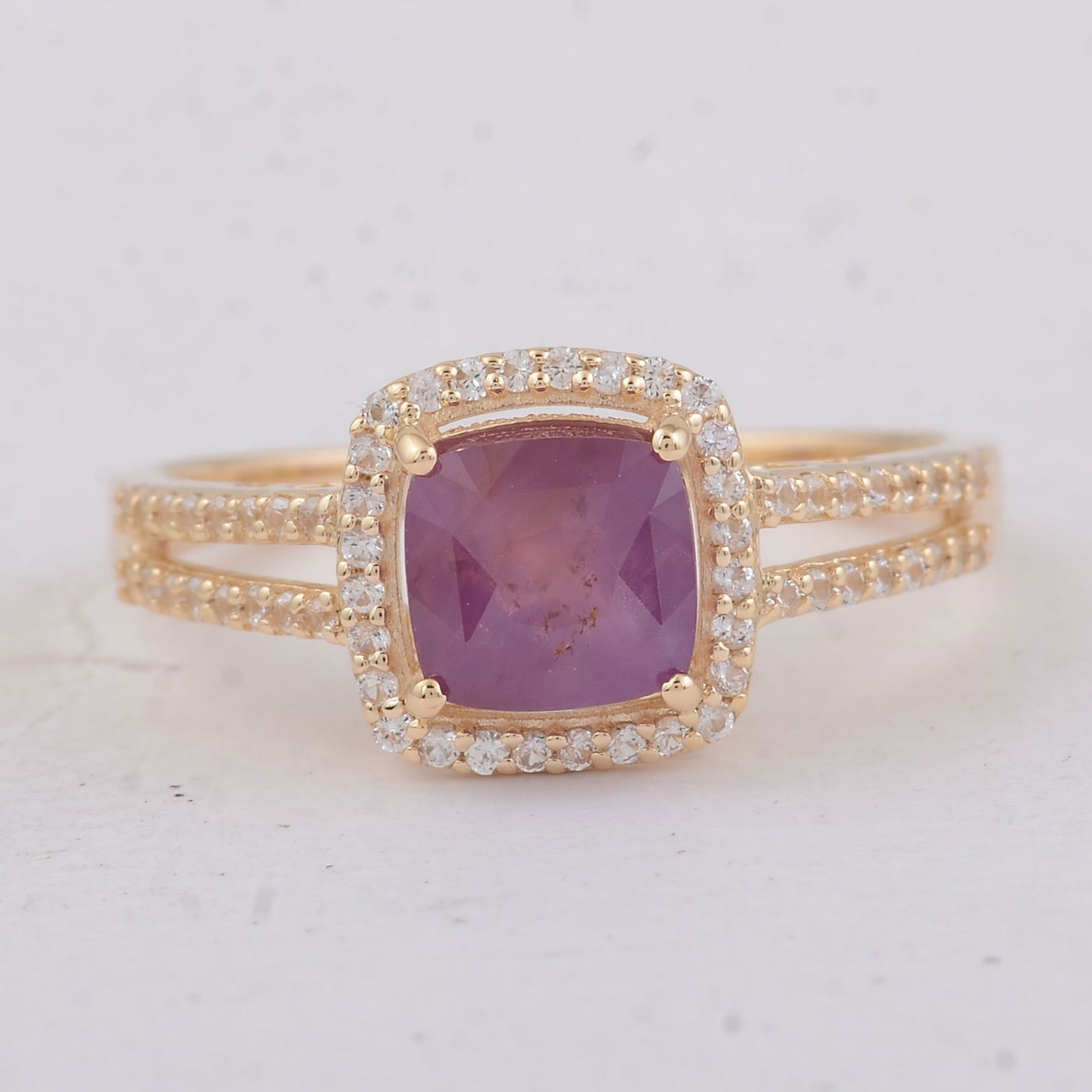 2.15 Ct Cushion Fancy Sapphire 9K Gold Ring: Title:2.15 Ct Cushion Fancy Sapphire 9K Gold RingDescription:2.15 Total Carat Fancy Sapphire 9K Gold Ring Specifications - Total Weight 2.41 g - Center Gemstone Fancy Sapphire - Gemstone Carat Weight