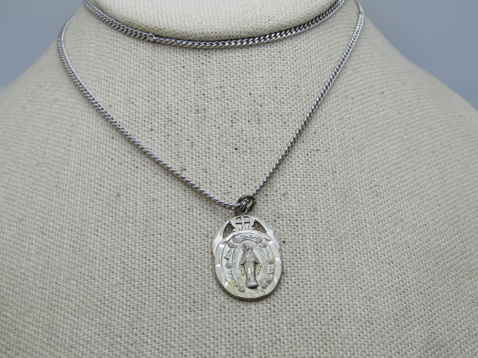 Vintage Sterling Blessed Mother Metal Necklace 24", Unisex, 1960's-1970's: Vintage Sterling Blessed Mother Metal Necklace 24", Unisex, 1960's-1970's. Catholic medal/pendant. Chain is likely newer and is not serling but the pendant/metal is and is marked sterling and tests as