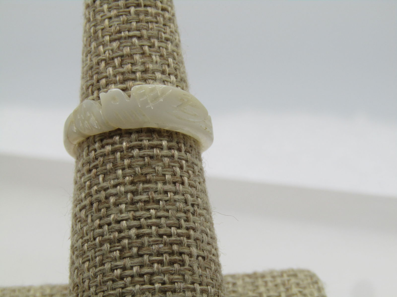 Vintage Carved Mother-of-Pearl Dove Ring, Sz. 7.5, 1960's, 1970's: Vintage Carved Mother-of-Pearl Dove Ring, Sz. 7.5, 1960's, 1970's. Carved bird that looks like a dove in a band ring that is papx. 5.9mm at the widest point at it's one wind and tapers to appx.