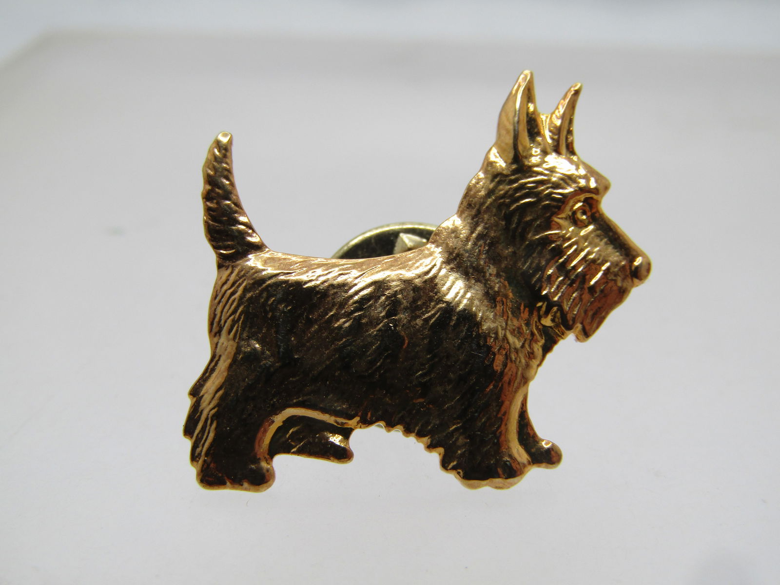 Vintage Scottish Terrier Tack Pin, 1960's-1970's: Vintage Scottish Terrier Tack Pin, 1960's-1970's Reserve: $15.00 Shipping:Domestic: Flat-rate of $6.00 to anywhere within the contiguous U.S.International: Foreign shipping rates are determined by