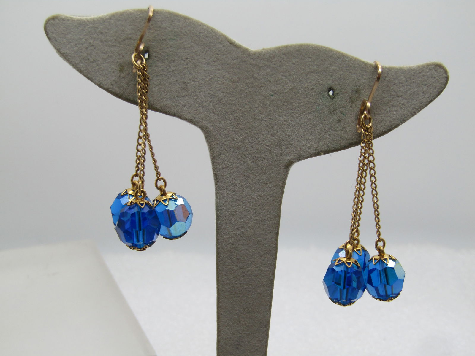 Vintage Blue Aurora Borealis Crystal Drop Earrings, Slide-On, 1950's-1960's: Vintage Blue Aurora Borealis Crystal Drop Earrings, Slide-On, 1950's-1960's. T hese have a double loop slide on post with three aurora borealis 8mm blue crystal beads that drop on an appx. 1" length