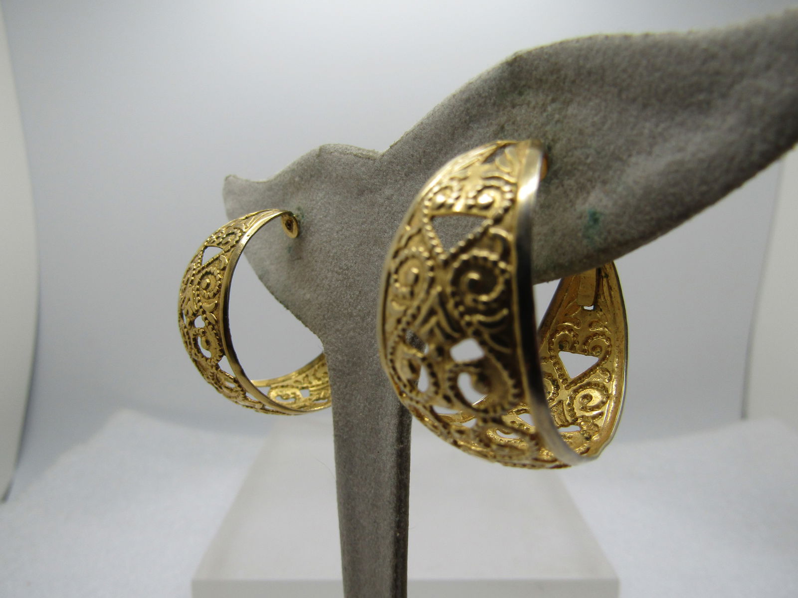 Vintage Wide Filigree Hoop Earrings, Pierced, 1980's, 1-1/8": Vintage Wide Filigree Hoop Earrings, Pierced, 1980's, 1-1/8". Tapered at the top to slightly under 1/4" and 5/8" at the bottom where it is widest. It has a hinged ring that goes through the post at