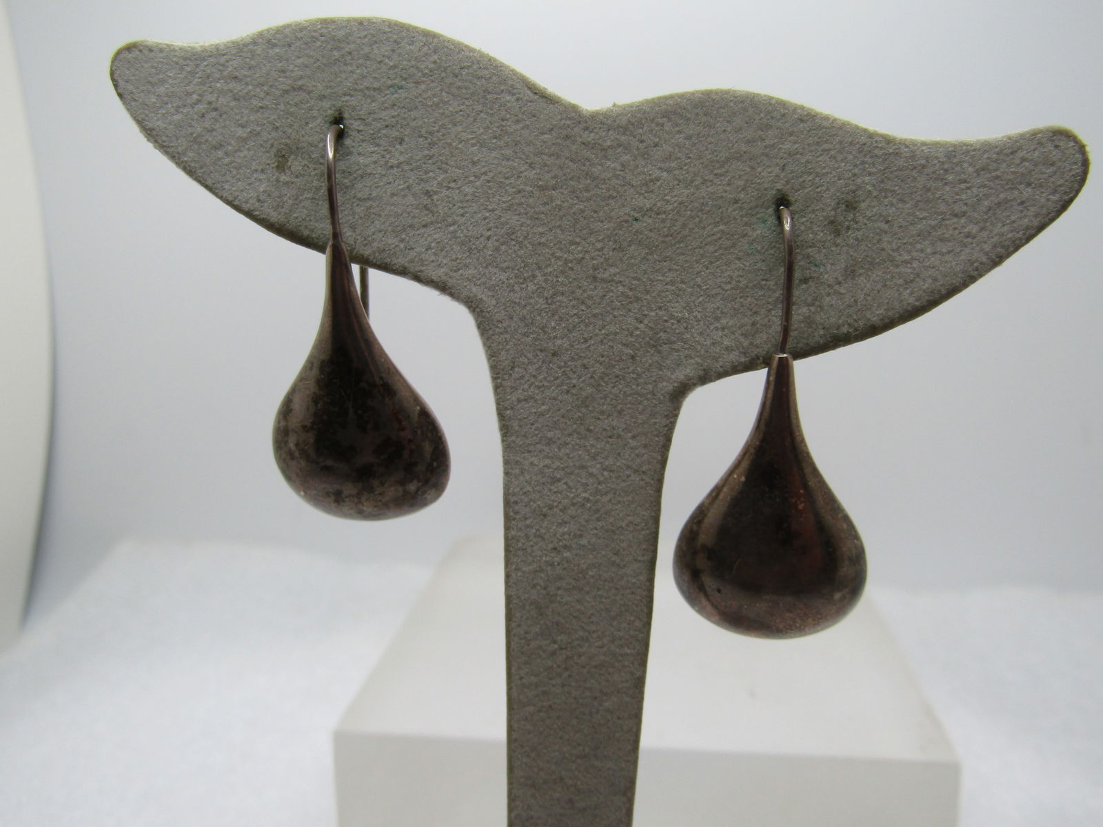 Vintage Sterling Teardrop Earrings, Pierced, 1970's-1980's: Vintage Sterling Puffy Teardrop Earrings, Pierced, 1970's-1980's. Long hook post with a bean-like pear-shaped teardrop that is puffy. The earrings are appx. 1.5" long from the curve in the hook post a