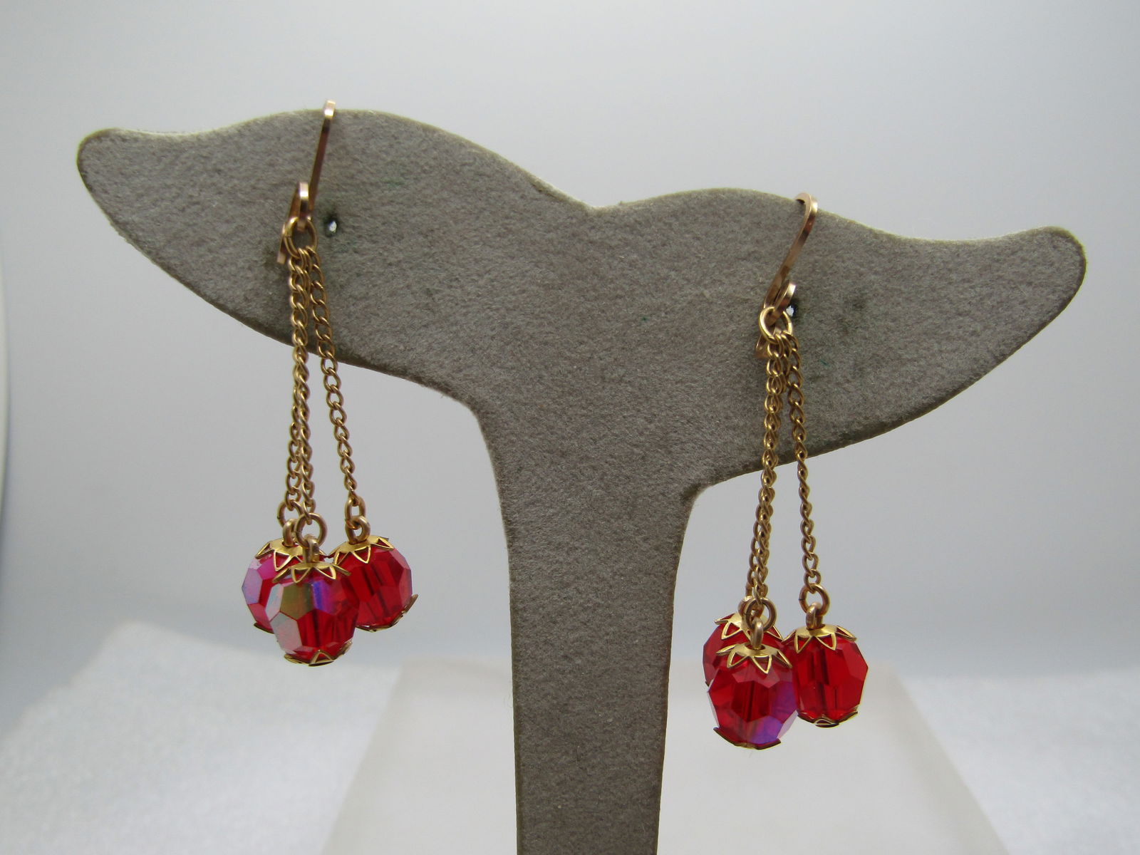 Vintage Red Aurora Borealis Slide Earrings, Dangles, 1960's: Vintage Red Aurora Borealis Slide Earrings, Dangles, 1960's. Three appx. 7.5mm round faceted red aurora borealis beads dangling from chains that are appx. 1.25" Long. The total length of the
