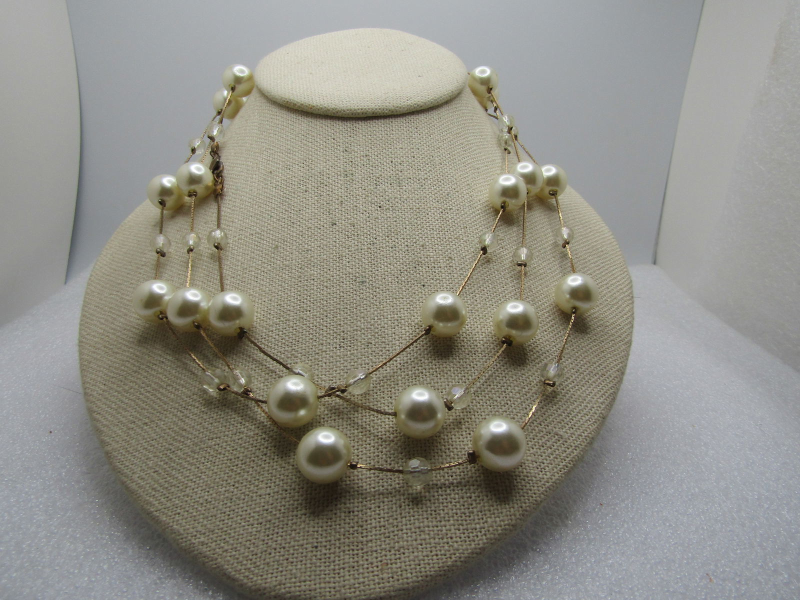 Vintage Faux Pearl & Clear AB Necklace 54", 1980's: .Vintage Faux Pearl & Clear AB Necklace 54", 1980'sGold tone serpentine chain with 11.5 faux pearls and 5.5 clear faceted acrylic beads with aurora borealis finish. there are also gold tone clamper be