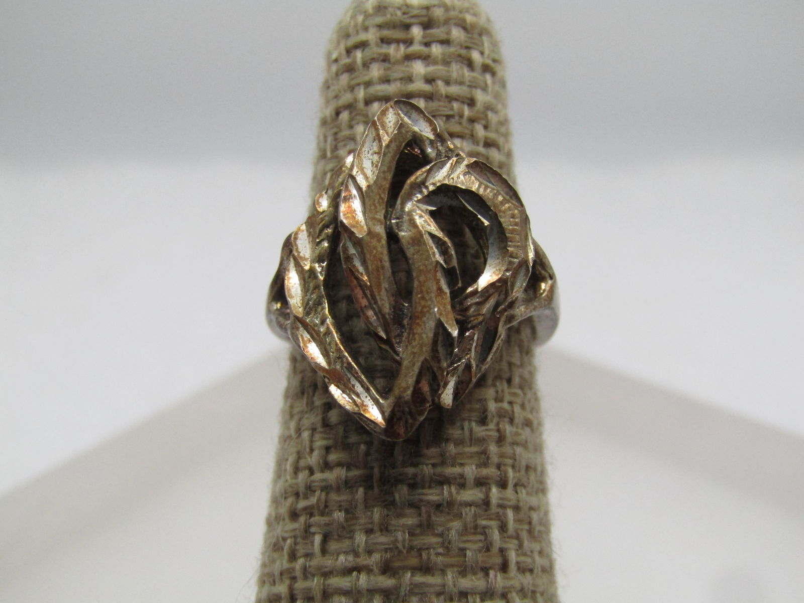 Vintage Pointed Diamond Cut Tiered Ring, Sz. 6, Signed Silpada, 1990's: Vintage Pointed Diamond Cut Tiered Ring, Sz. 6, Signed Silpada, 1990's. It has an overall marquise shaped open frame design with and smaller one that is mounted offset and through the larger shape