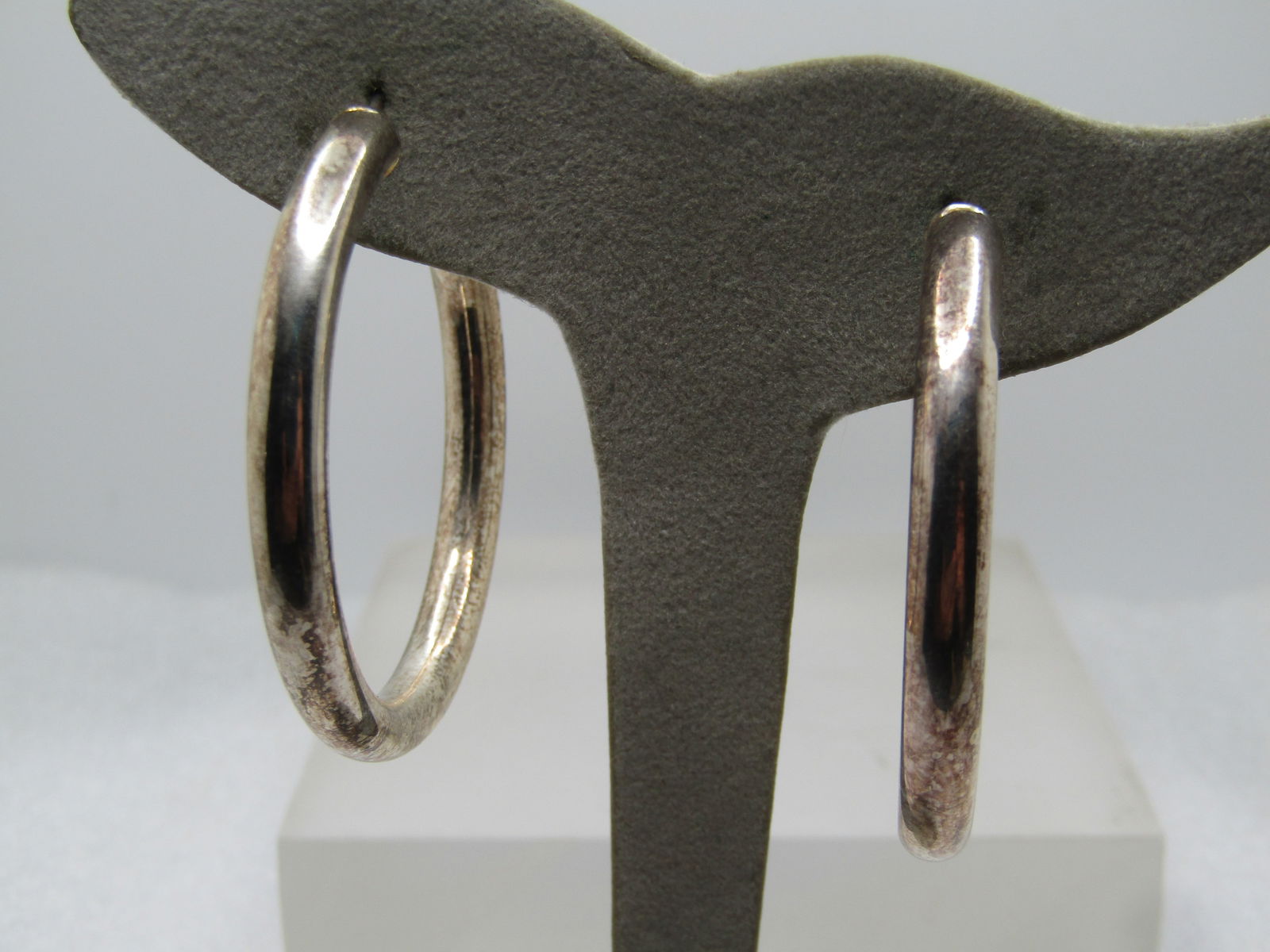 Vintage 4.5mm Hoop Earrings 2", Silver Plated, 1980's-1990's: Vintage 4.5mm Hoop Earrings 2", Silver Plated. These are marked .925 but are plated, not sterling. They are appx. 1980's-1990's with the 1960's-1970's vibe. They have a post with a hinged ring to