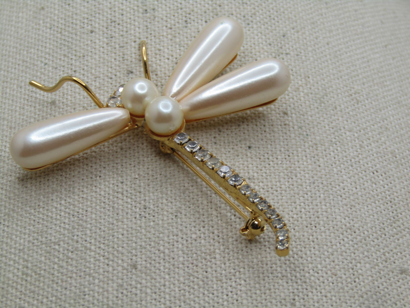 Vintage Rhinestone and Faux Pearl Dragonfly Brooch 1980's. - 2
