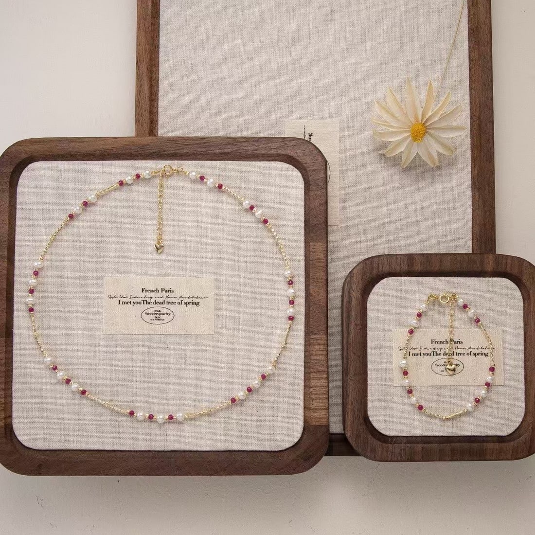 Ruby and Pearl Jewelry Set: Title: Ruby and Pearl Jewelry Set Description: This exquisite set perfectly combines dazzling rubies with lustrous freshwater pearls, showcasing the essence of elegance. Each piece is meticulously