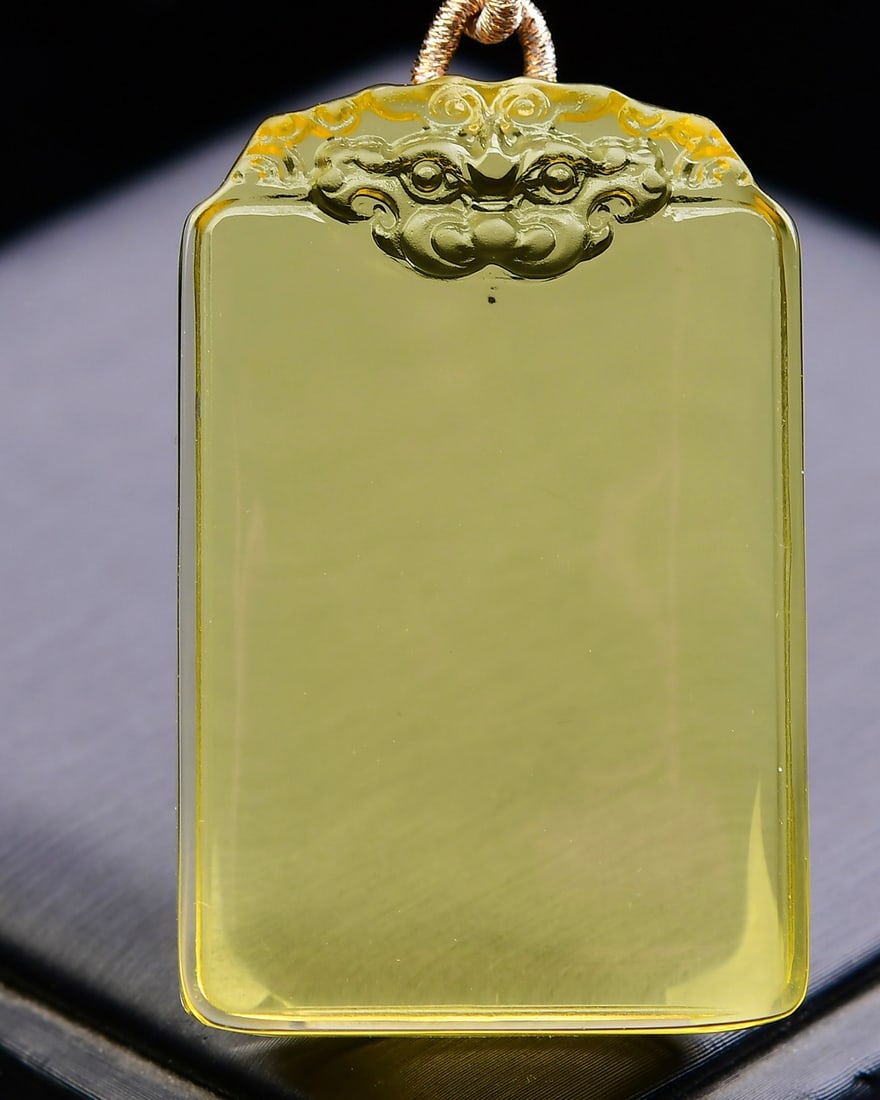 Natural Brazilian Citrine Pixiu Pendant: Title: Natural Brazilian Citrine Pixiu Pendant Description: This pendant perfectly presents the essence of prosperity and protection with its exquisite natural yellow crystal, carefully carved into