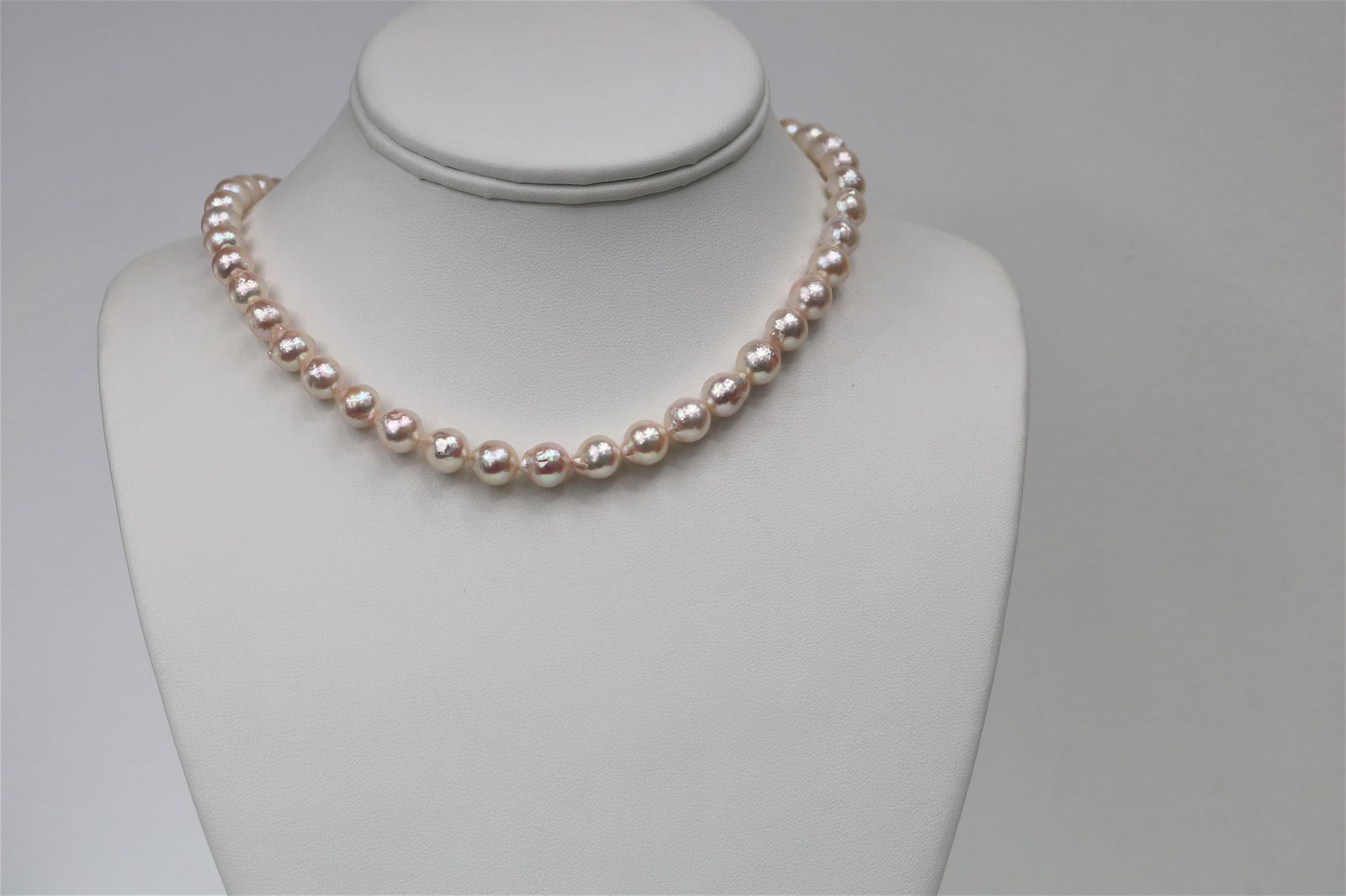 8-8.5mm Japanese Akoya Baroque Necklace with 14k Clasp: Title:8-8.5mm Japanese Akoya Baroque Necklace with 14k ClaspDescription:AAA Quality Necklace, White Rose in Color, Pearls from Japan, 45 pearl pieces, 18 inches hand knotted with 14k YG fish-hook