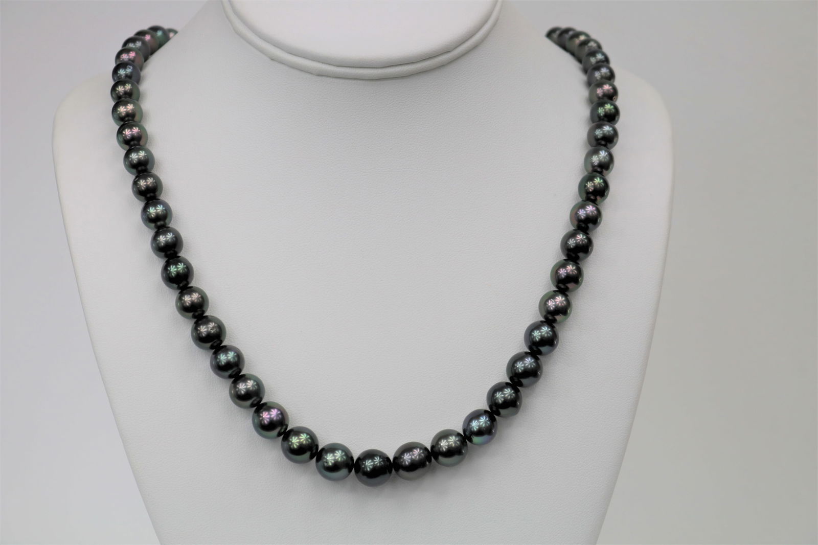 8-10mm Tahitian Round Peacock Necklace with 14k Clasp: Title:8-10mm Tahitian Round Peacock Necklace with 14k ClaspDescription:AAA Luster, Tahitian Round/Near Round Peacock Necklace, 43 pearl pieces, 18 inches hand knotted with 14k fish-hook