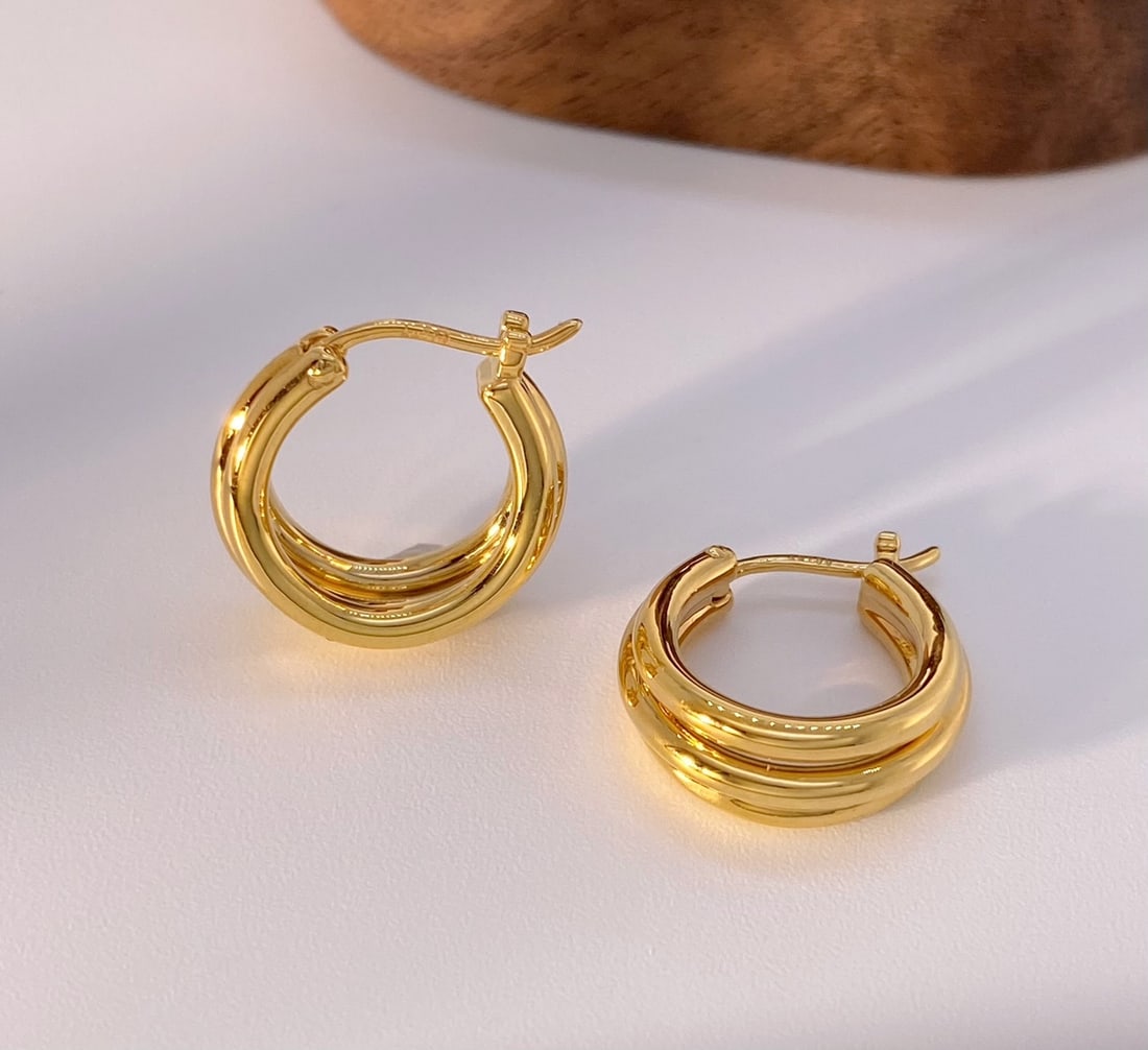 Mini Triple Tube Earrings: Title: Mini Triple Tube Earrings Description: This minimalist and stylish design of triple tube earrings perfectly combines simplicity with modern fashion, making it an ideal accessory for daily