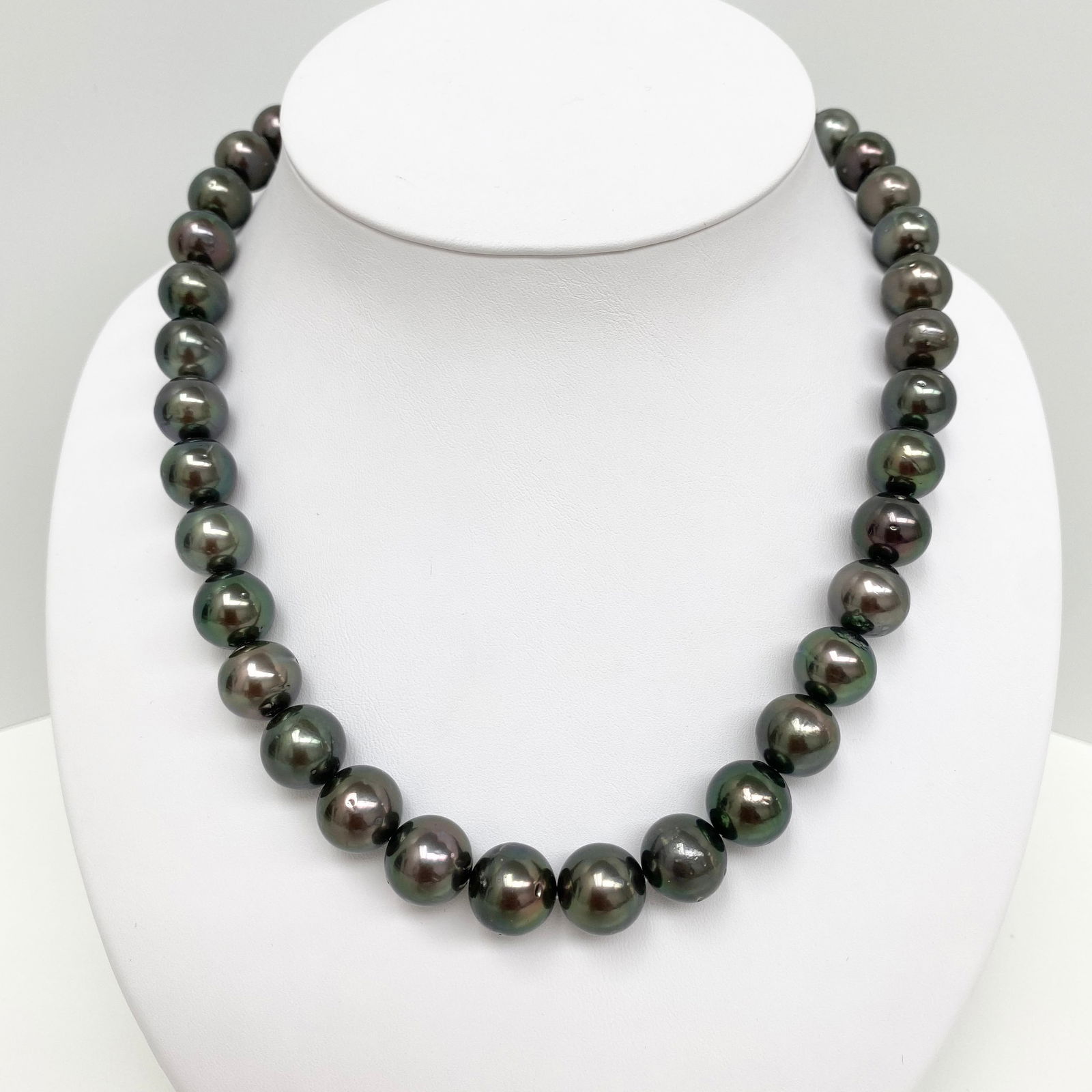 11-13mm Tahitian Dark Green Round/Near-Round Pearl Necklace with 14k Clasp: Title:11-13mm Tahitian Dark Green Round/Near-Round Pearl Necklace with 14k ClaspDescription:AAA Luster, Tahitian Dark Green Round/Near-Round Pearl Necklace, 35 pearl pieces, 18 inches hand-knotted