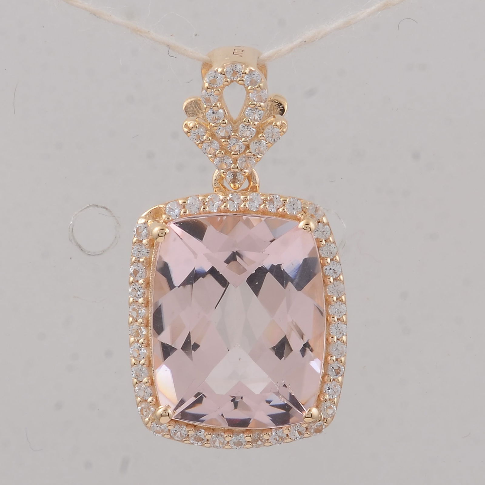 3.55 Ct Cushion Morganite 9K Gold Pendant: 3.55 Total Carat Morganite 9K Gold Pendant Specifications - Total Weight 2.01 g - Center Gemstone Morganite - Gemstone Carat Weight 3.3 Carats - Gemstone Measurements 11X9X5.30 mm - Additional
