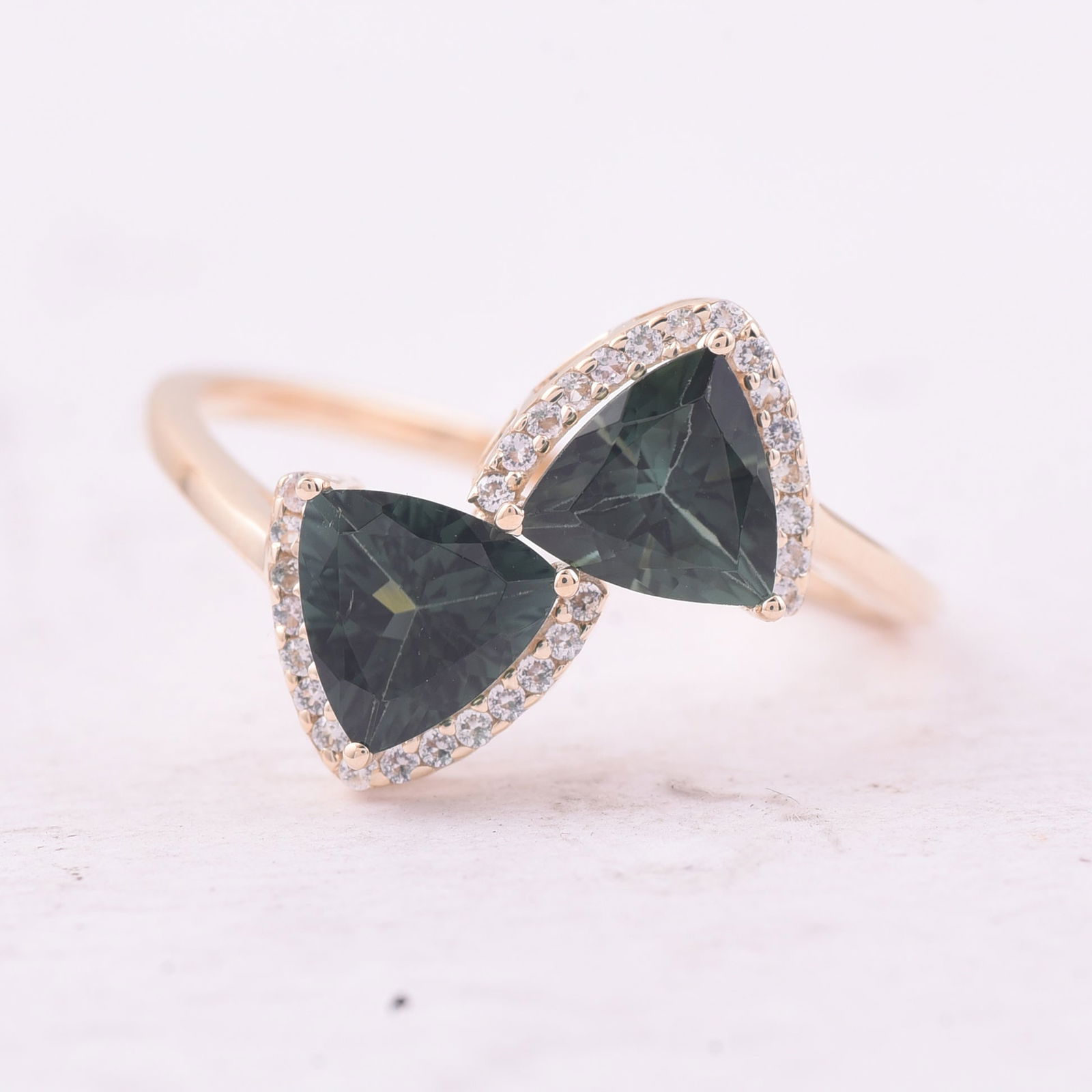 1.55 Ct Trillion Tourmaline 9K Gold Ring: 1.55 Total Carat Tourmaline 9K Gold Ring Specifications - Total Weight 1.818 g - Center Gemstone Tourmaline - Gemstone Carat Weight 1.42 Carats - Gemstone Measurements 6X6 mm - Additional Gemstones