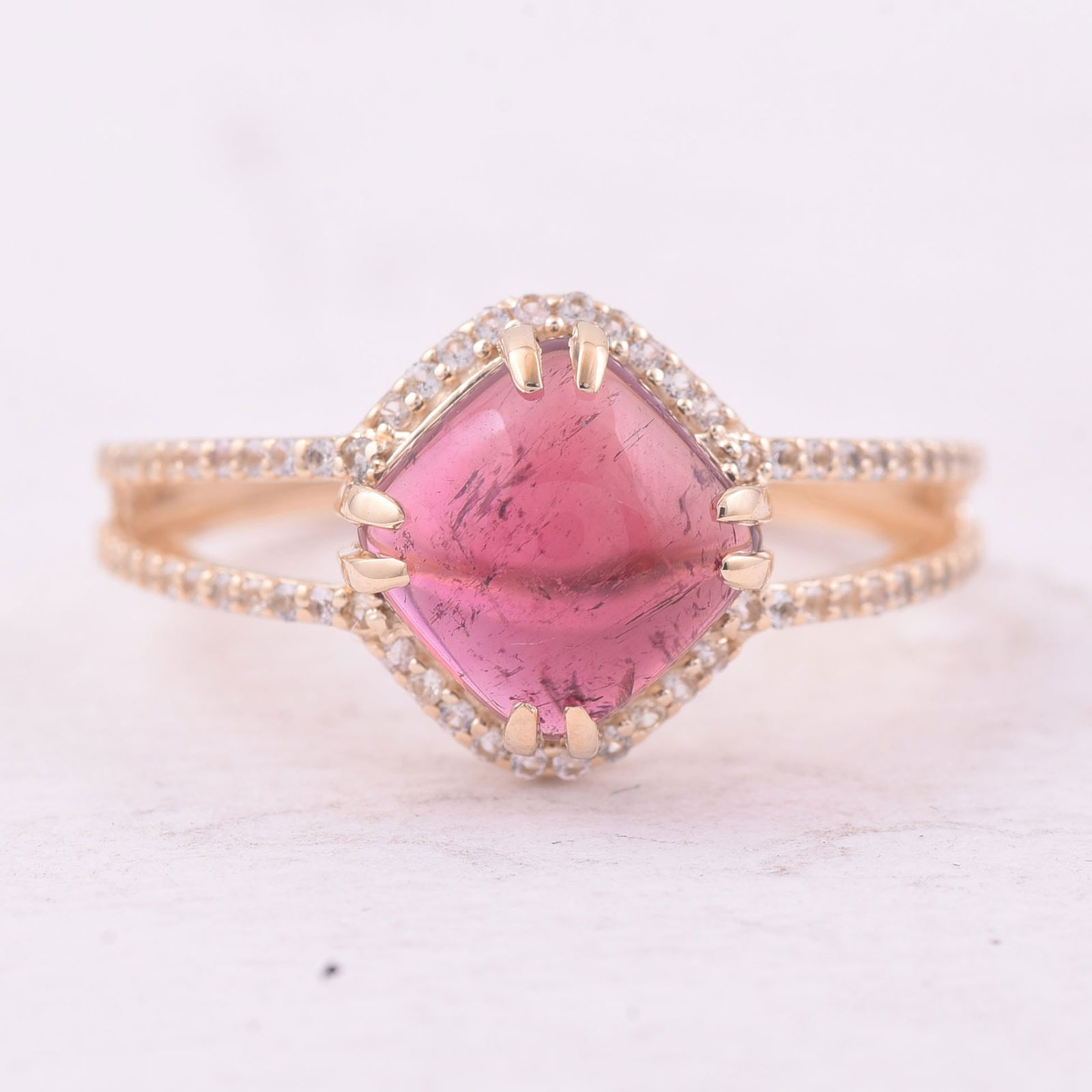 3.14 Ct Cushion Tourmaline 9K Gold Ring: 3.14 Total Carat Tourmaline 9K Gold Ring Specifications - Total Weight 2.44 g - Center Gemstone Tourmaline - Gemstone Carat Weight 2.83 Carats - Gemstone Measurements 8X8 mm - Additional Gemstones