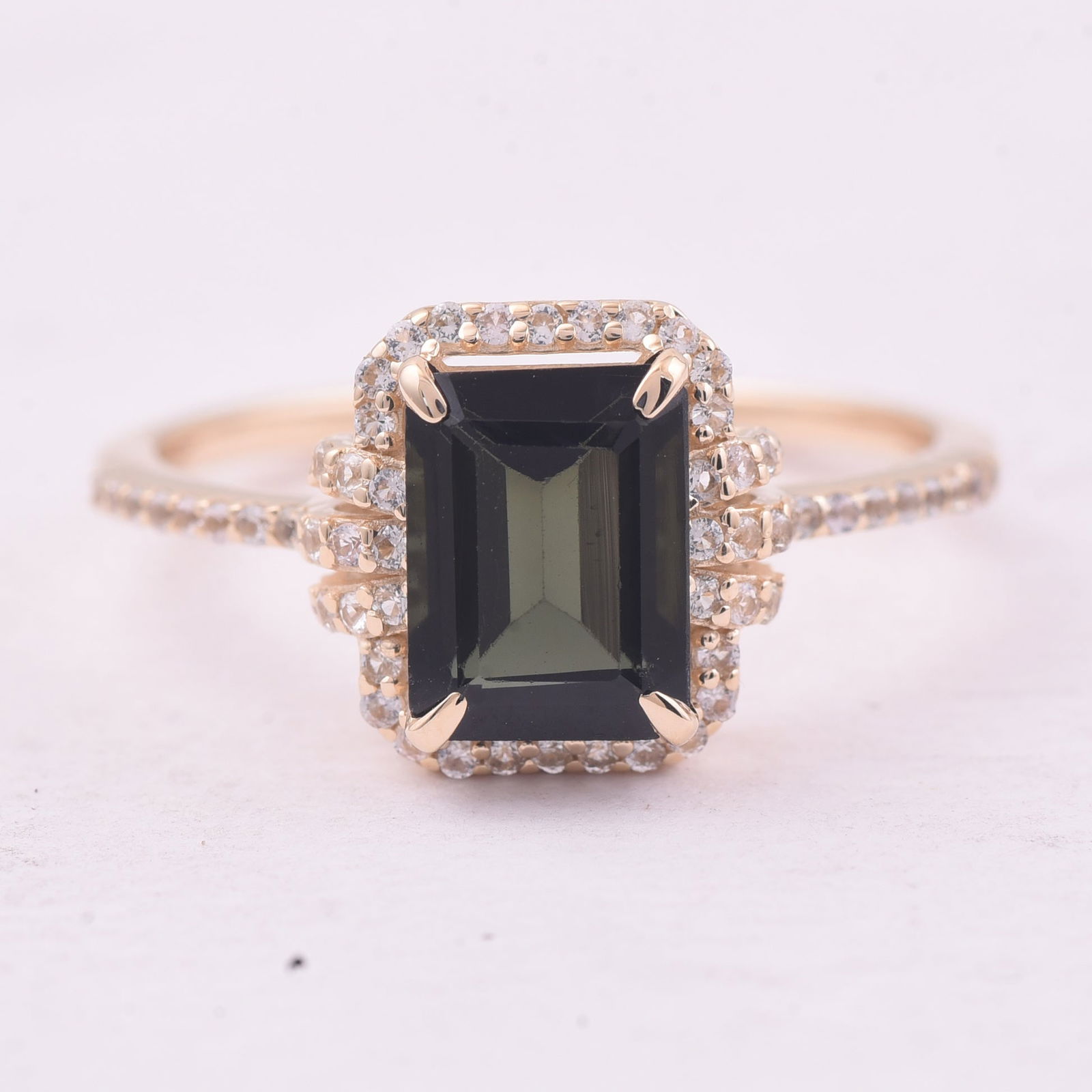 1.71 Ct Octagon Tourmaline 9K Gold Ring: 1.71 Total Carat Tourmaline 9K Gold Ring Specifications - Total Weight 1.919 g - Center Gemstone Tourmaline - Gemstone Carat Weight 1.42 Carats - Gemstone Measurements 8X6 mm - Additional Gemstones