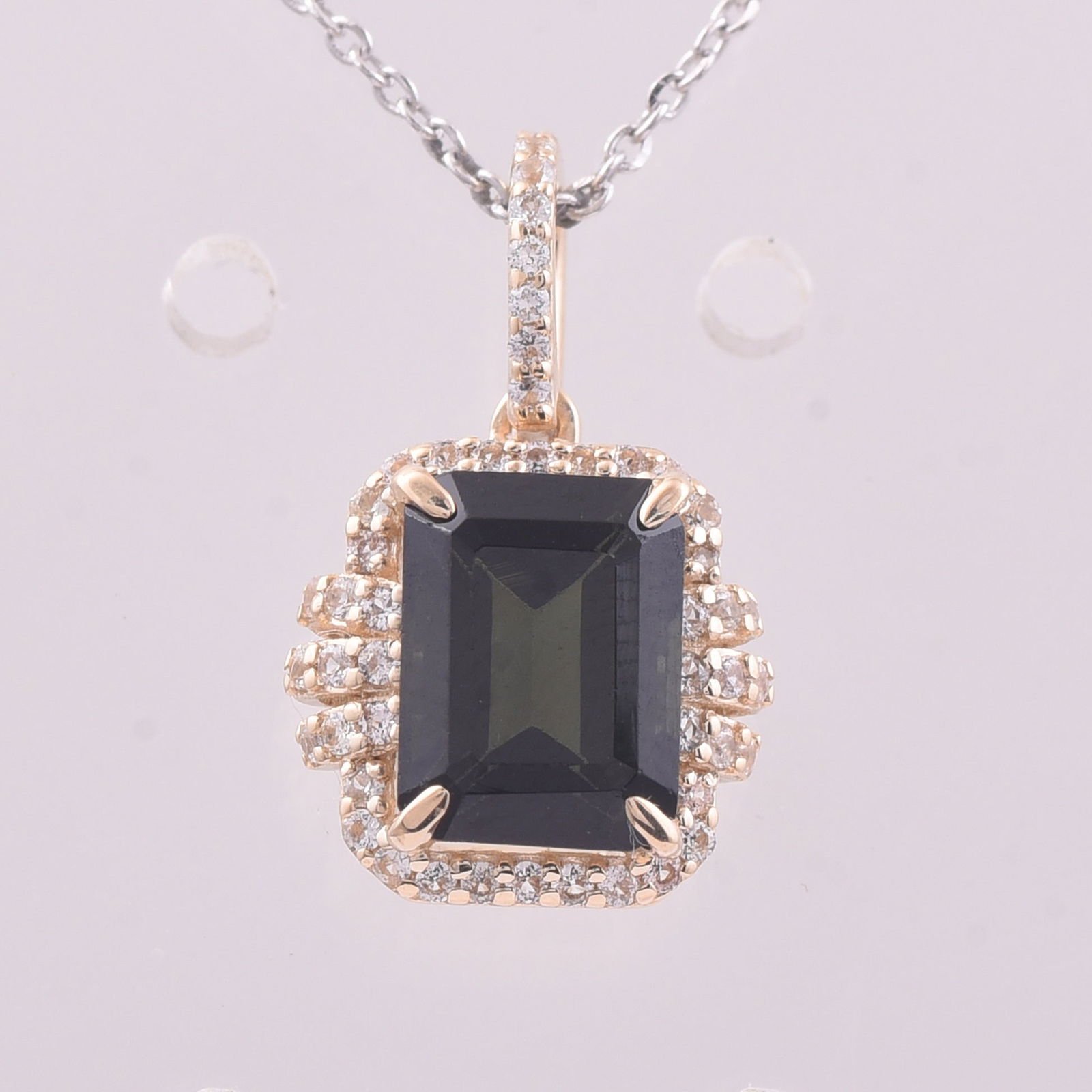 2.07 Ct Octagon Tourmaline 9K Gold Pendant: 2.07 Total Carat Tourmaline 9K Gold Pendant Specifications - Total Weight 1.379 g - Center Gemstone Tourmaline - Gemstone Carat Weight 1.87 Carats - Gemstone Measurements 8X6 mm - Additional