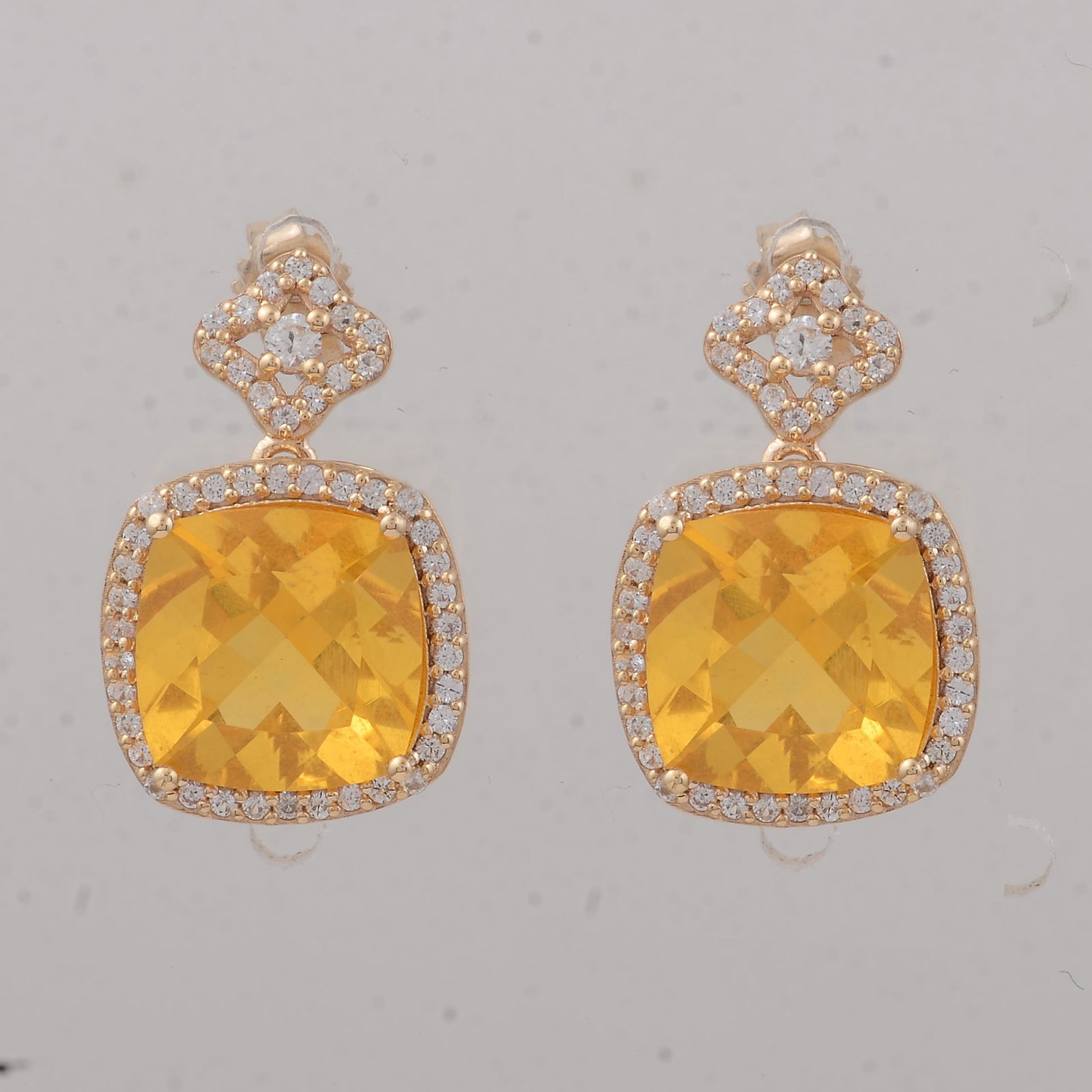 4.47 Ct Cushion B.R Fire Opal 9K Gold Earrings: 4.47 Total Carat B.R Fire Opal 9K Gold Earrings Specifications - Total Weight 3.411 g - Center Gemstone B.R Fire Opal - Gemstone Carat Weight 4 Carats - Gemstone Measurements 9X9X6.30 inch -