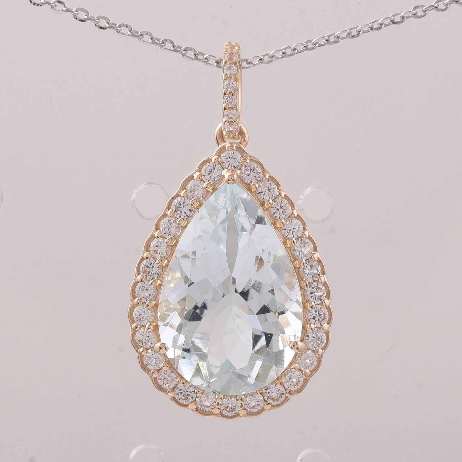 5.47 Ct Pear Aquamarine 9K Gold Pendant: 5.47 Total Carat Aquamarine 9K Gold Pendant Specifications - Total Weight 2.219 g - Center Gemstone Aquamarine - Gemstone Carat Weight 4.92 Carats - Gemstone Measurements 14.90X10X6.60 mm - Additional
