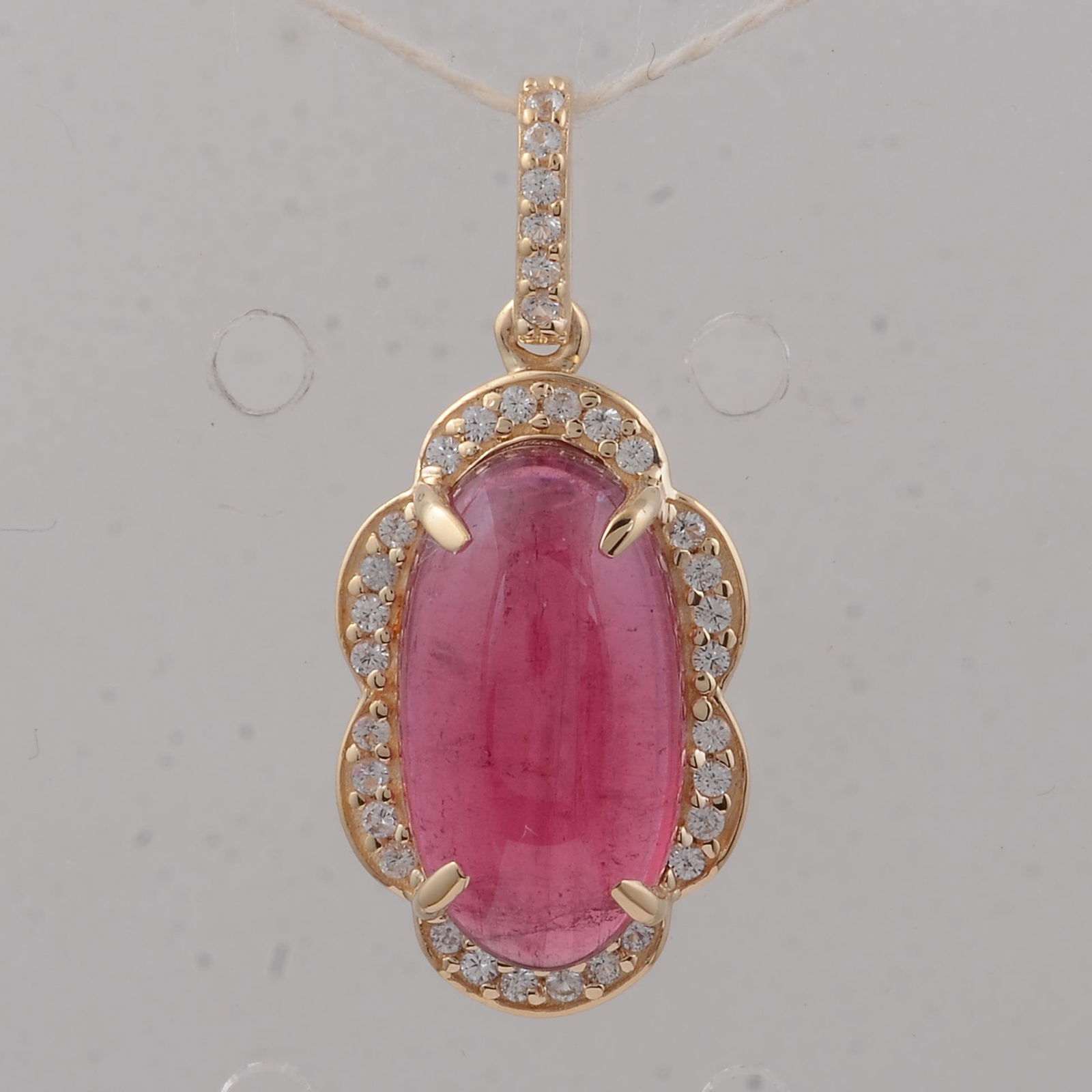 3.66 Ct Oval Tourmaline 9K Gold Pendant: 3.66 Total Carat Tourmaline 9K Gold Pendant Specifications - Total Weight 1.63 g - Center Gemstone Tourmaline - Gemstone Carat Weight 3.52 Carats - Gemstone Measurements 12.70X7X4.40 mm - Additional G