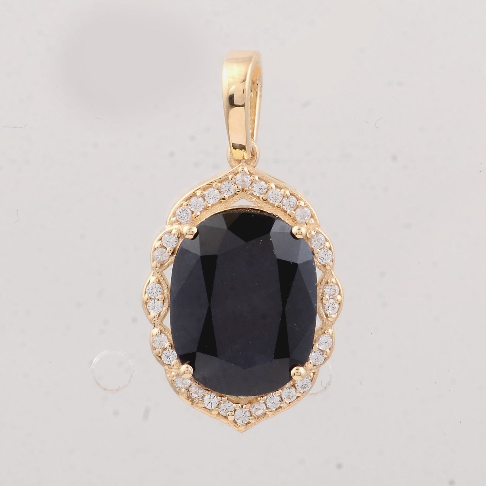 3.76 Ct Cushion Sapphire 9K Gold Pendant: 3.76 Total Carat Sapphire 9K Gold Pendant Specifications - Total Weight 1.84 g - Center Gemstone Sapphire - Gemstone Carat Weight 3.64 Carats - Gemstone Measurements 10.80X8.50X4.30 mm - Additional Ge