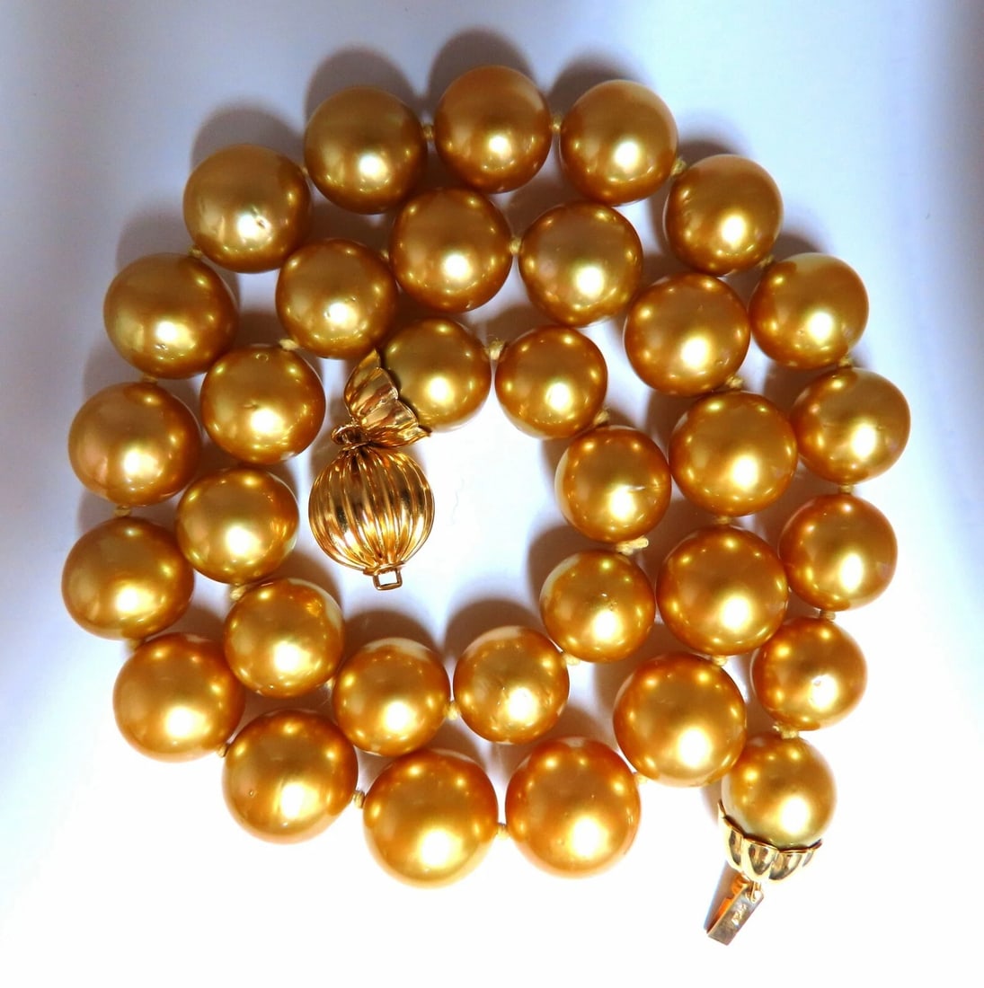 GIA certified Natural South Sea Golden Pearls Necklace 14mm**: Title: GIA certified Natural South Sea Golden Pearls Necklace 14mm** Description: Executive GIA Certified South Sea Golden Yellow Pearls Necklace The Natural Pinctada maxima (gold tipped oysters) Repo