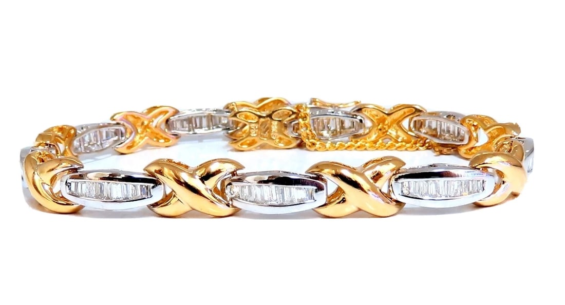 1.60ct natural baguette diamonds x bracelet 14 karat two-tone & safe chain**: Title: 1.60ct natural baguette diamonds x bracelet 14 karat two-tone & safe chain** Description: 1.60 carat natural bag of diamonds x link bracelet. H color si-1 clarity. 14 karat white and yellow