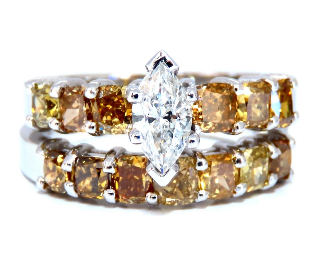 GIA Certified .50ct Natural Marquise & Fancy Color Diamonds Ring: Title: GIA Certified .50ct Natural Marquise & Fancy Color Diamonds Ring Description: Marquise & Fancy Band Suite GIA Certified: .50ct. Natural Marquise Brilliant diamond. G-color Si-2 clarity 7.92 x 4