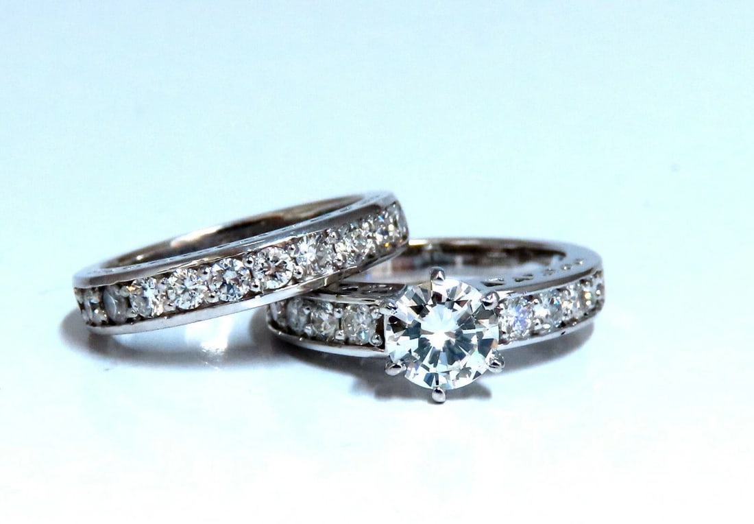 GIA certified 1.01ct Round Diamond Ring & Band 14kt: Title: GIA certified 1.01ct Round Diamond Ring & Band 14kt Description: Engagement ring & Band. GIA Certified 1.01ct. Round cut diamond ring. Report: 2215423328 H-color, Si-1 Clarity (GIA Report attac