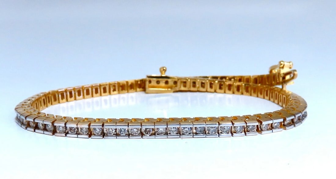 1.40ct Natural Diamonds Tennis Bracelet 14kt Gold Classic Channel Mount**: Title: 1.40ct Natural Diamonds Tennis Bracelet 14kt Gold Classic Channel Mount** Description: Classic Tennis Round set diamonds, Channel smooth finish 1.40ct. Natural diamonds bracelet. Round, full
