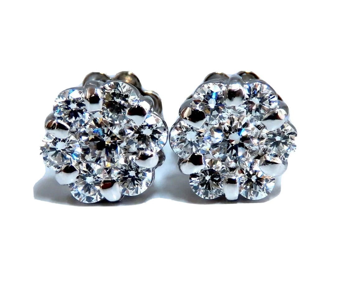 1.10ct Natural Diamonds Cluster Earrings 14kt gold**: Title: 1.10ct Natural Diamonds Cluster Earrings 14kt gold** Description: Cluster & Halo Stud Earrings. 1.10cts of natural round diamonds: G-color, Vs-2 clarity. 14kt. white gold 2.9 grams. Earrings me