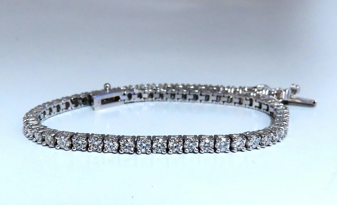 2.87ct Natural Diamonds Tennis Bracelet 14kt Gold Classic Riviera**: Title: 2.87ct Natural Diamonds Tennis Bracelet 14kt Gold Classic Riviera** Description: Classic Tennis 2.87ct. Natural diamonds bracelet. Round, full cuts G color Vs-2 clarity. 14kt. white gold 7.2 Gr