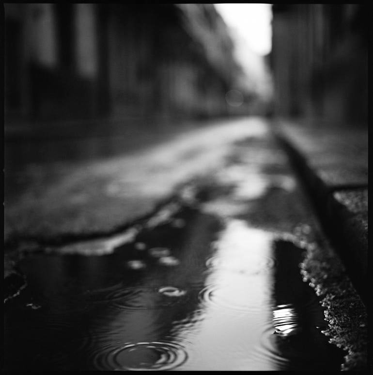 Rain I, Havana, Cuba - Silver Gelatin: Title: Rain I, Havana, Cuba - Silver Gelatin Photograph - Limited Edition of 10 Artist: Paul Cooklin Origin: United Kingdom Medium: Photography, Gelatin on Paper Dimensions: 20 W x 20 H x 0.1 D in Res