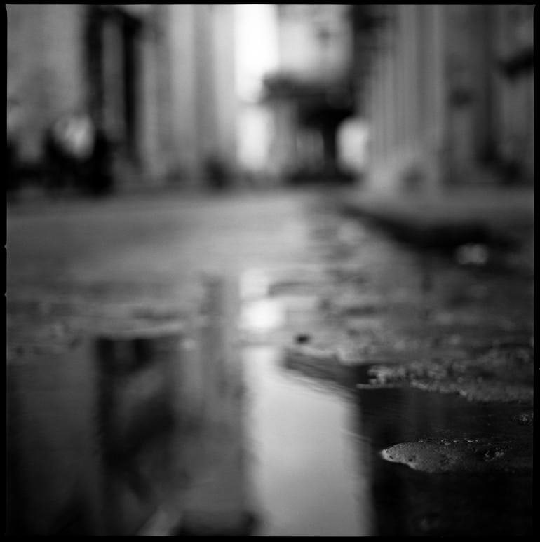 Rain II, Havana, Cuba - Silver Gelatin: Title: Rain II, Havana, Cuba - Silver Gelatin Photograph - Limited Edition of 10Artist: Paul CooklinOrigin: United KingdomMedium: Photography, Gelatin on PaperDimensions: 20 W x 20 H x 0.1 D in 