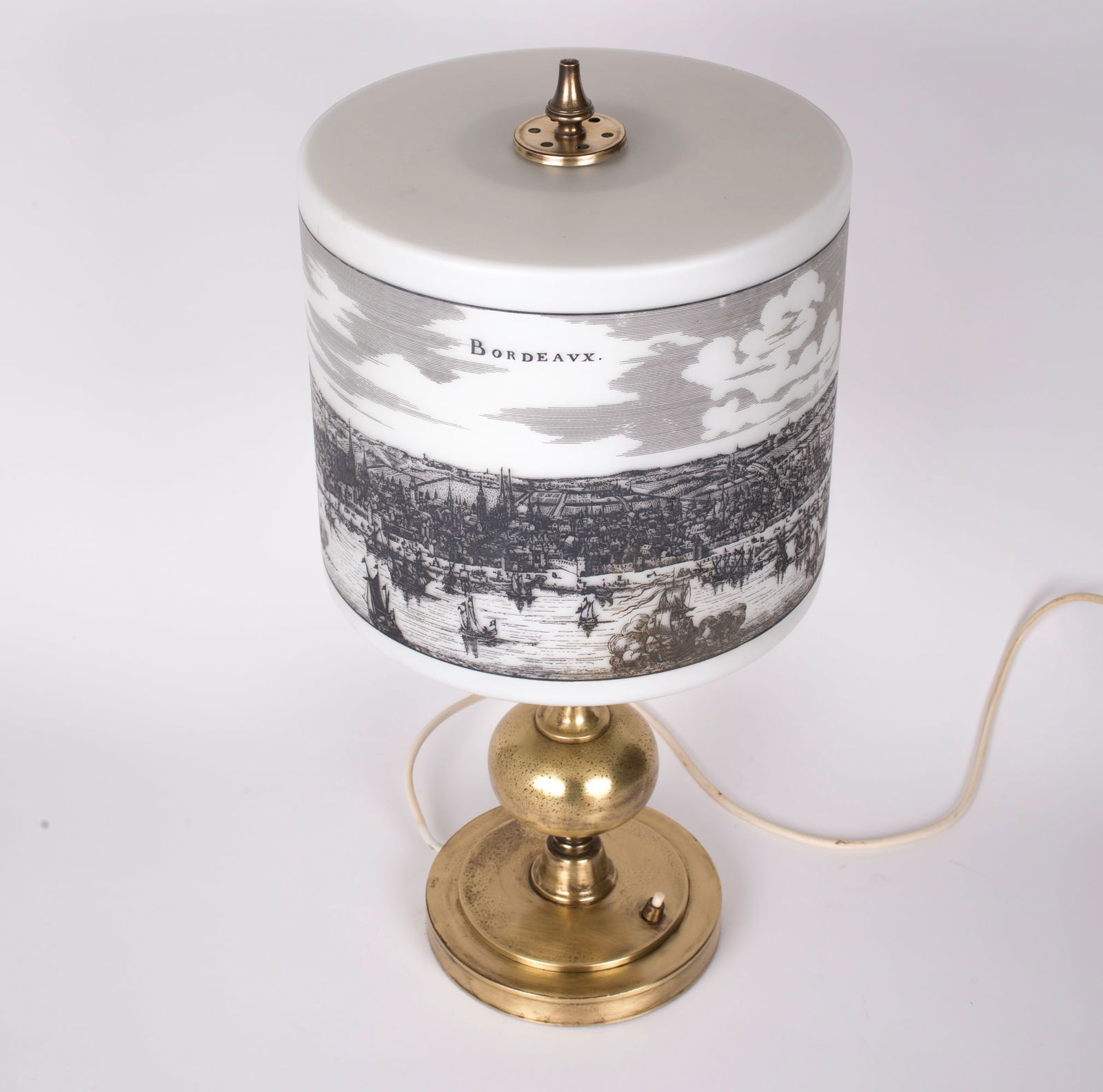 Mid century table lamp opaline in the manner of Fornasetti: Title: Mid century table lamp opaline in the manner of Fornasetti Description: This Mid century table lamp features an opaline glass shade that brings a warm and inviting glow. Its unique design