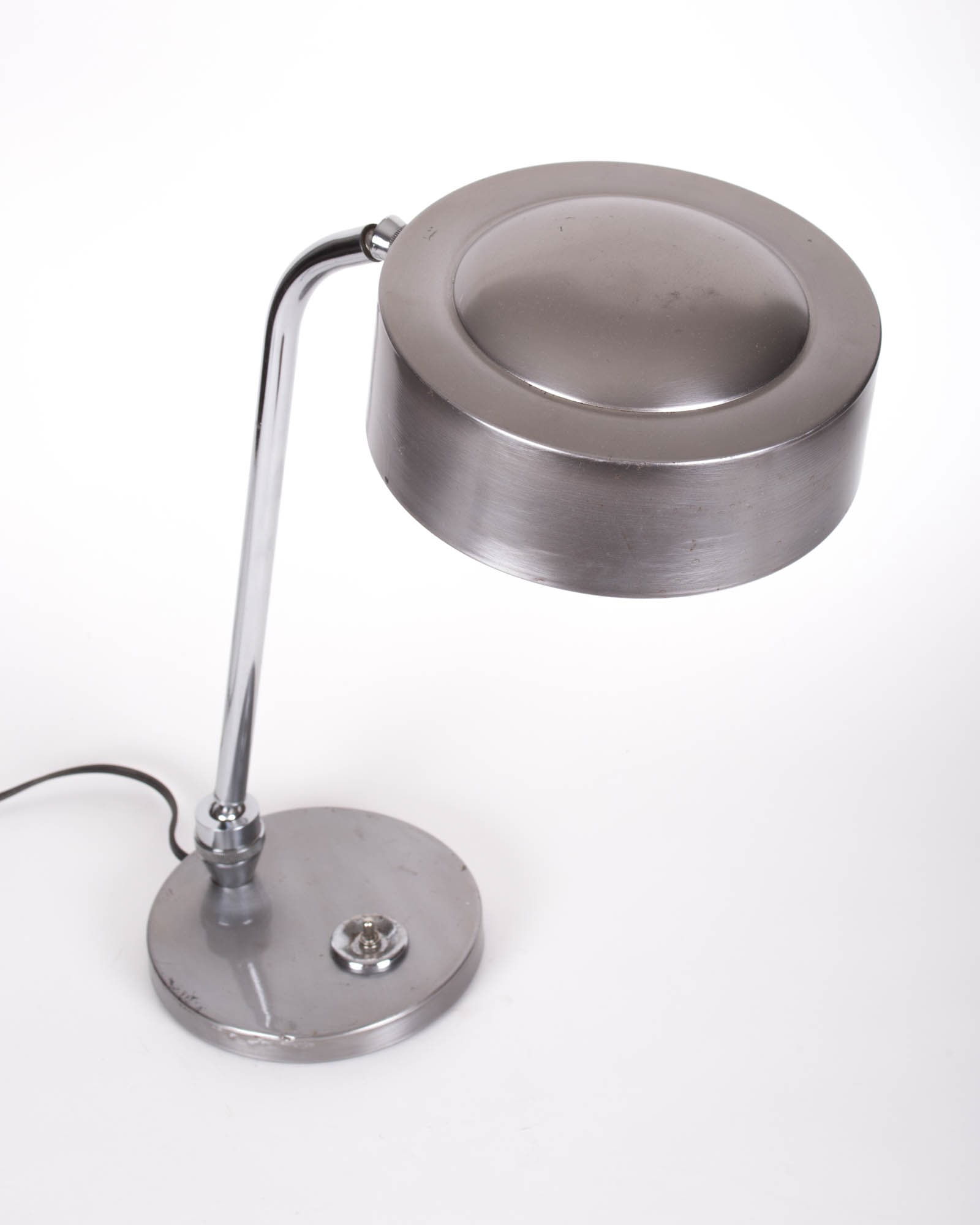 900 Jumo: Title: 900 Jumo Description: A modernist desk lamp made in the 1960's by Jumo; an important lamp making company from France. Jumo introduced a desk lamp for industrial office use, widely used in