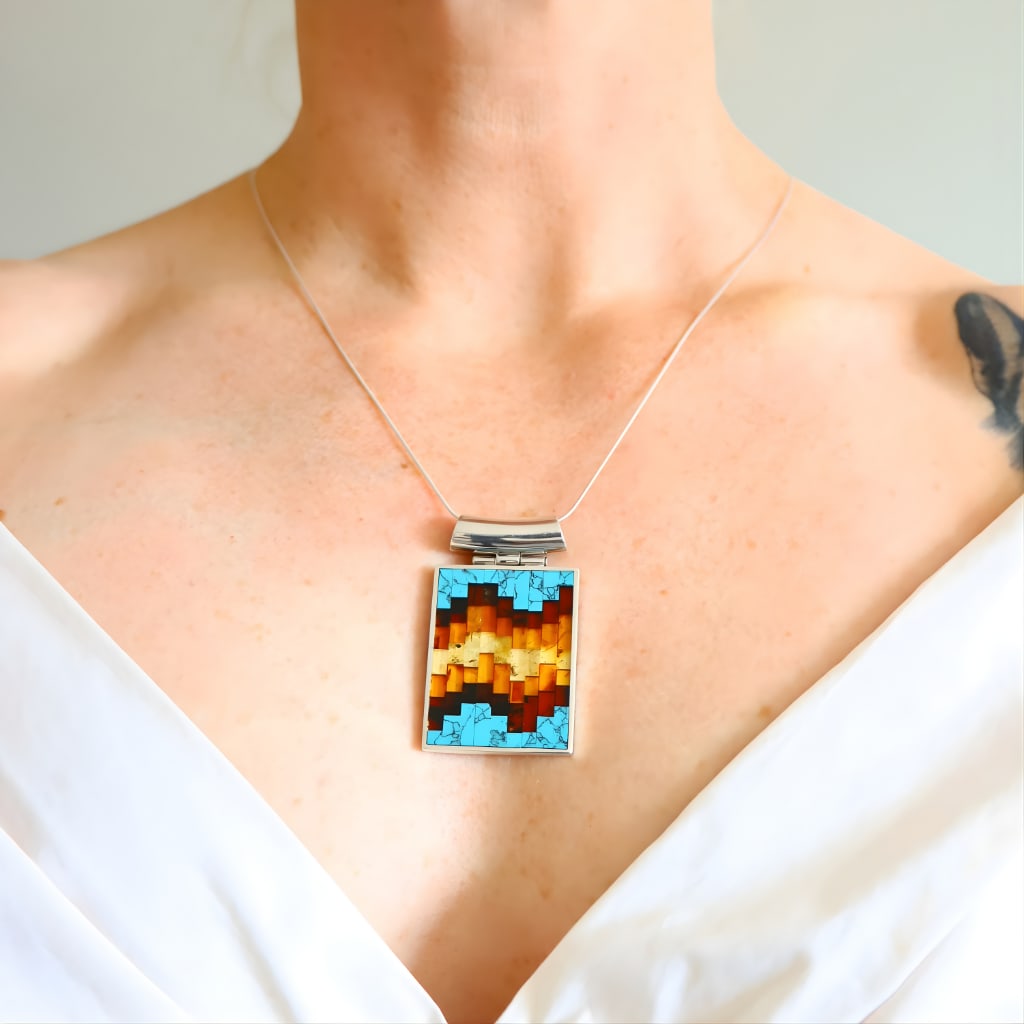 Baltic Amber and Turquoise Necklace- Sterling Silver: Title:Baltic Amber and Turquoise Necklace- Sterling SilverDescription:This Baltic amber and turquoise necklace features a geometric mosaic inlay crafted in solid sterling silver by the artists at MTM