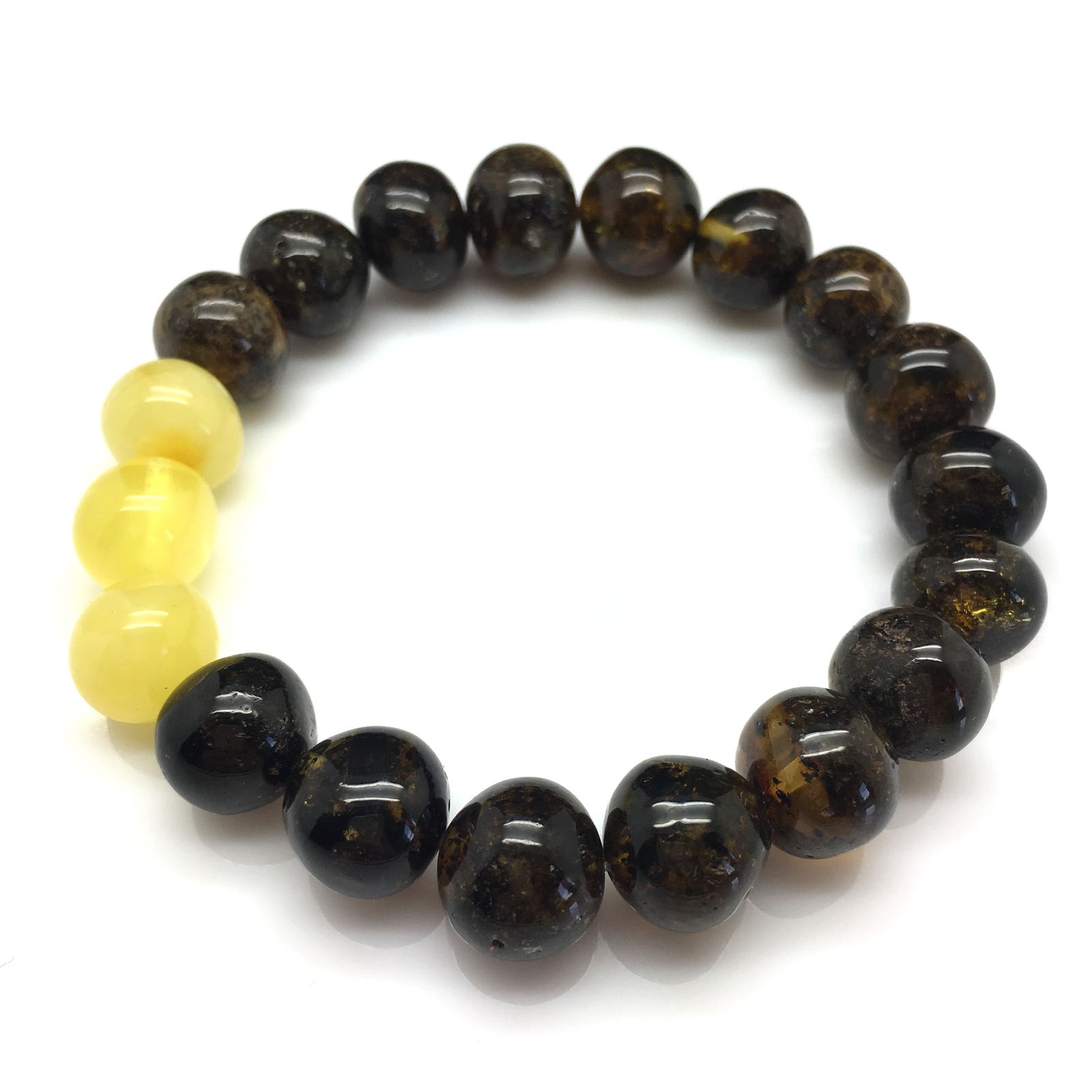 Antique Amber Bracelet made from Hand Carved Amber beads: Title:Antique Amber Bracelet made from Hand Carved Amber beadsMetal:NoneGemstone:AmberWeight:14.2 gSize:Bead size: 12.58 mm Bead size: 0.495 inches Made of:(Reconstituted Amber or Whole Stone):Whole