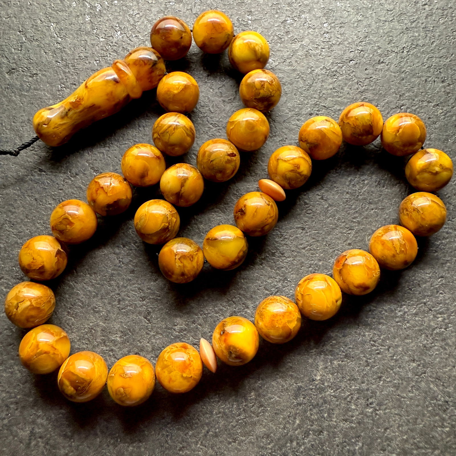 Phenomenal Vintage Amber Tesbih made from Round Amber beads: Title:Phenomenal Vintage Amber Tesbih made from Round Amber beadsMetal:NoneGemstone:AmberWeight:36.0 gSize:Bead size: 12.0 mm Bead size: 0.472 inches Made of:(Reconstituted Amber or Whole