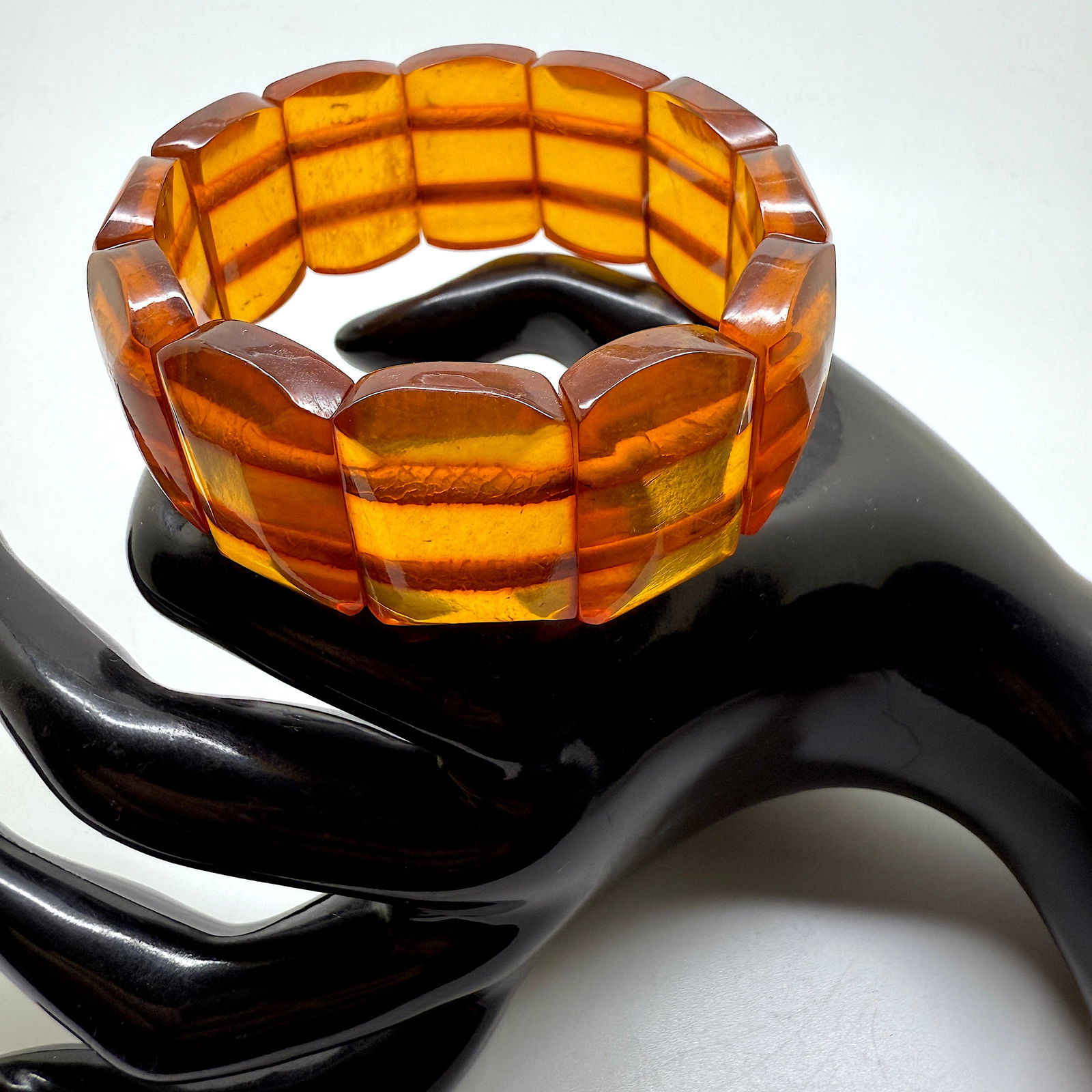 Stunning Vintage Amber Bracelet made from Rectangle shaped Amber beads: Title:Stunning Vintage Amber Bracelet made from Rectangle shaped Amber beadsMetal:NoneGemstone:AmberWeight:33.9 gSize:Bead size: 26.0 x 18.0 mm Bead size: 1.024 x 0.709 inches Made of:(Reconstituted