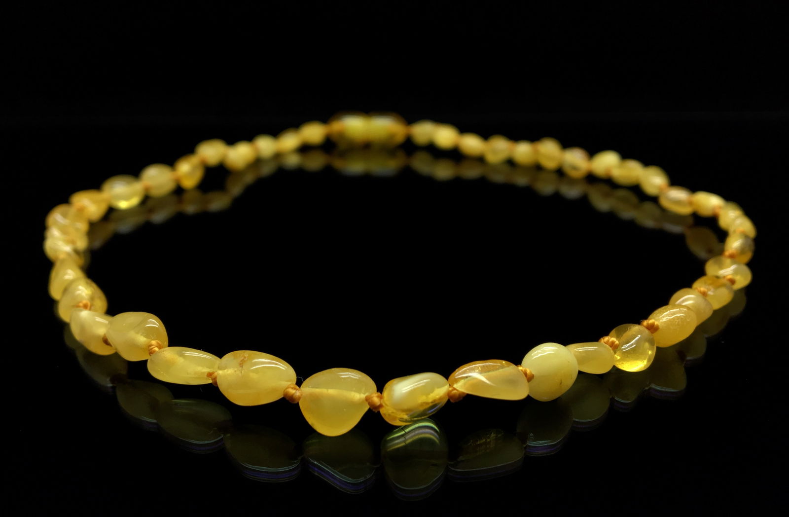 Unique and Grand Amber Necklace made from Hand Carved Amber beads: Title:Unique and Grand Amber Necklace made from Hand Carved Amber beadsMetal:NoneGemstone:AmberWeight:3.4 gSize:Bead size: 4.8 mm Bead size: 0.189 inches Made of:(Reconstituted Amber or Whole