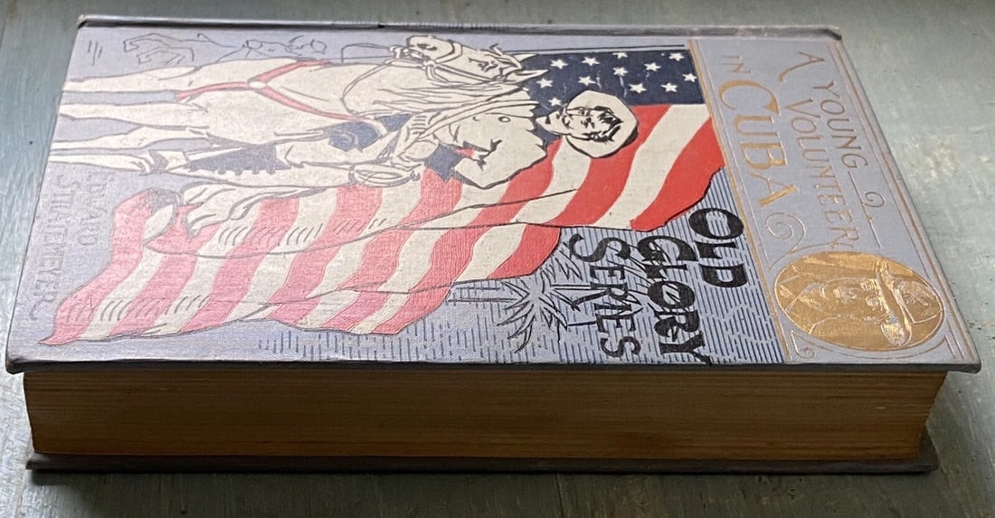 A YOUNG VOLUNTEER IN CUBA by Edward Stratemeyer. First Ed. 1898. Old Glory Ed. - 8