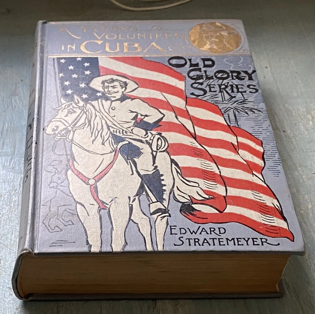 A YOUNG VOLUNTEER IN CUBA by Edward Stratemeyer. First Ed. 1898. Old Glory Ed. - 9