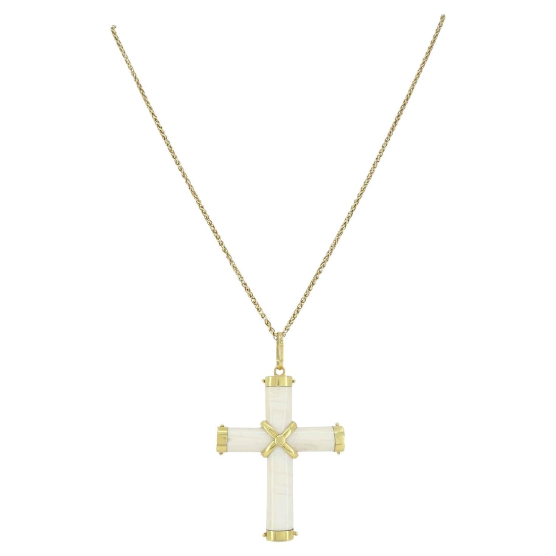 Italian 18K Gold Carved Bone Cross Pendant 14K Gold Chain Necklace: Title: Italian 18K Gold Carved Bone Cross Pendant 14K Gold Chain Necklace Description: About the Item Bone and 18K gold cross pendant paired with a 14K gold chain. The pendant is Italian and dates to